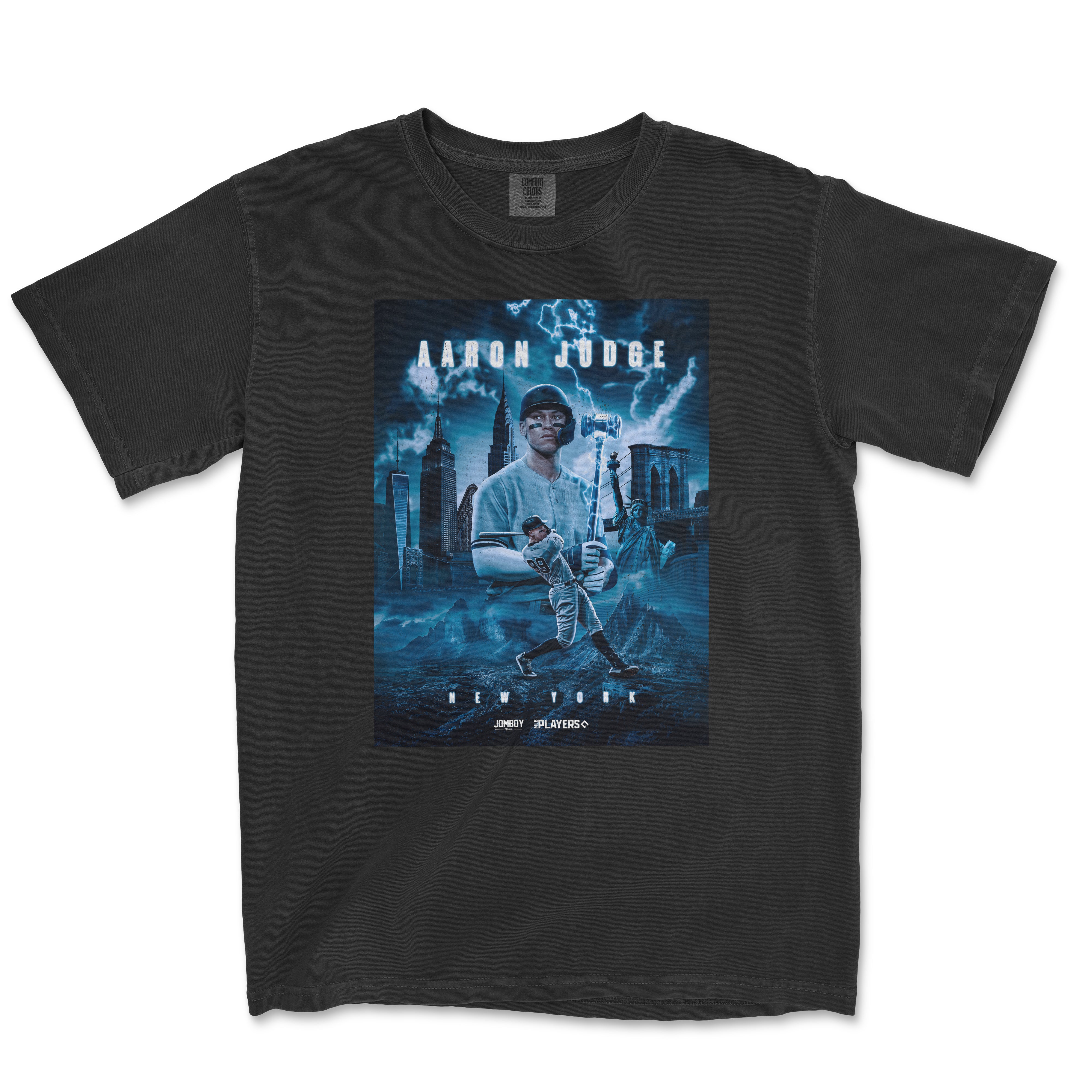 Black Comfort Colors T-shirt featuring a blue-toned graphic of Aaron Judge with NYC skyline, lightning, and baseball imagery.