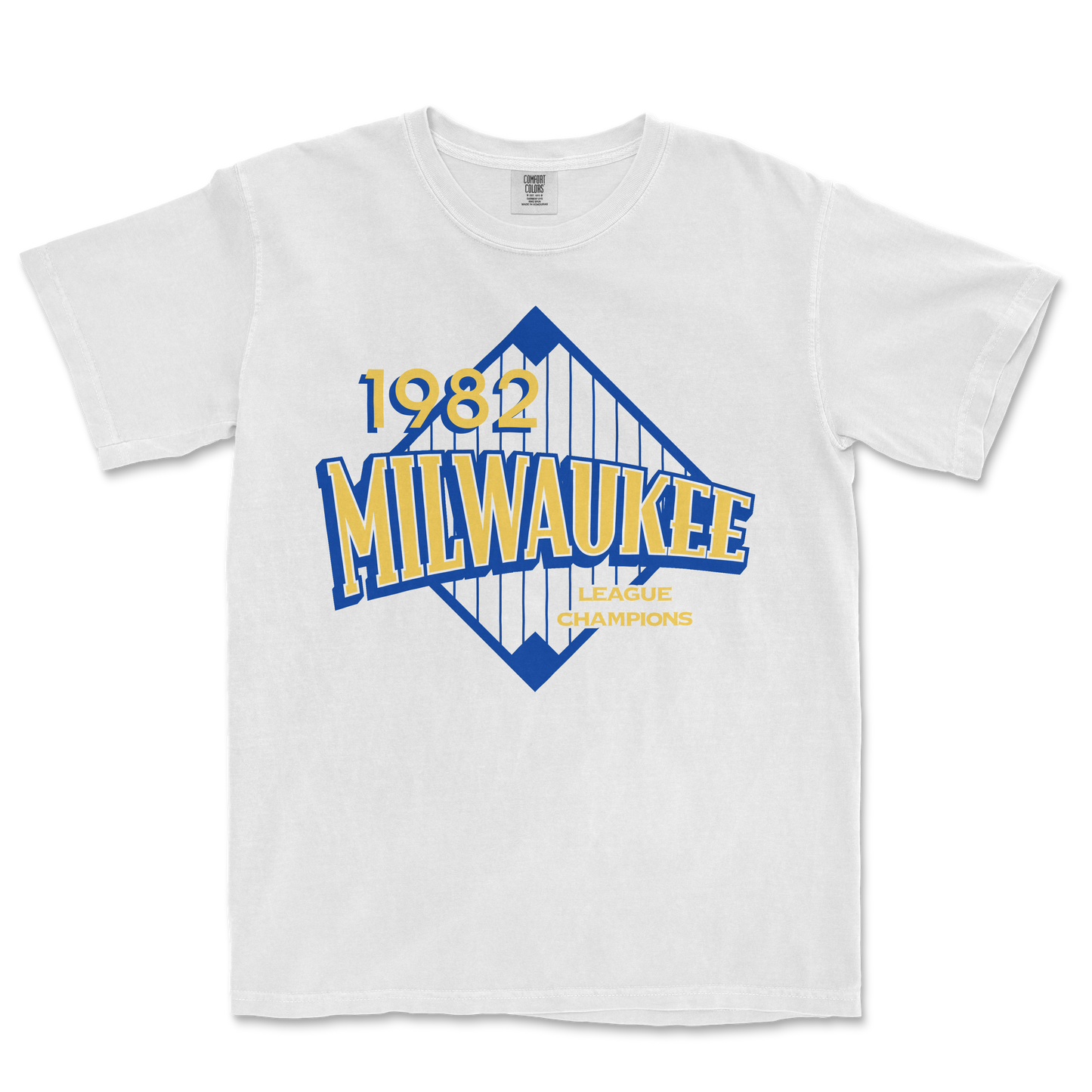 White Comfort Colors T-shirt featuring a vintage Milwaukee Brewers 1982 league champions graphic design in blue and yellow.