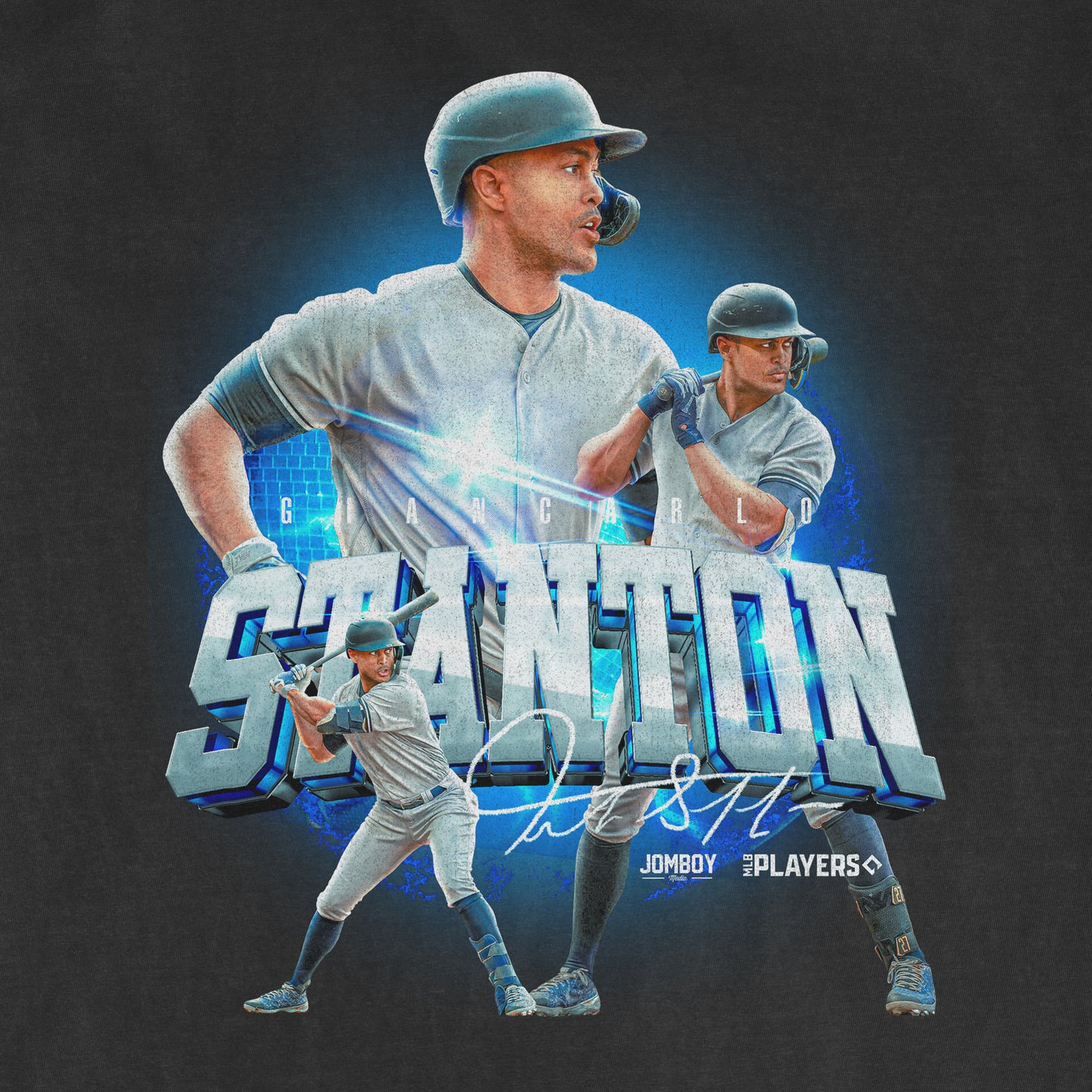 Graphic t-shirt design featuring multiple dynamic images of a baseball player in action, set against a dark background with the text "STANTON" prominently displayed in large, bold letters with a 3D effect. Additional design elements include a signature and hashtags