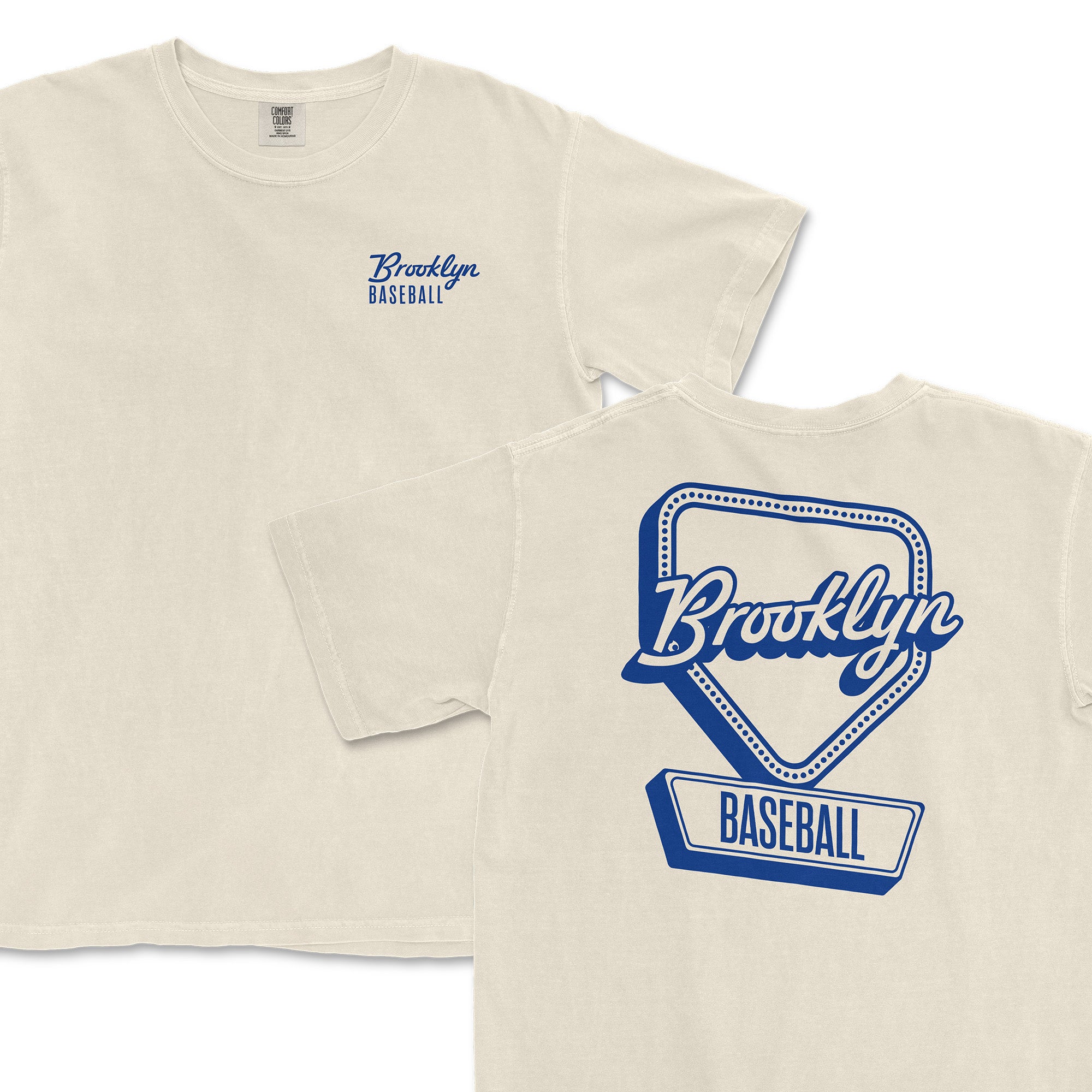 Cream-colored t-shirt featuring "Brooklyn Baseball" text on the front and a graphic design on the back.