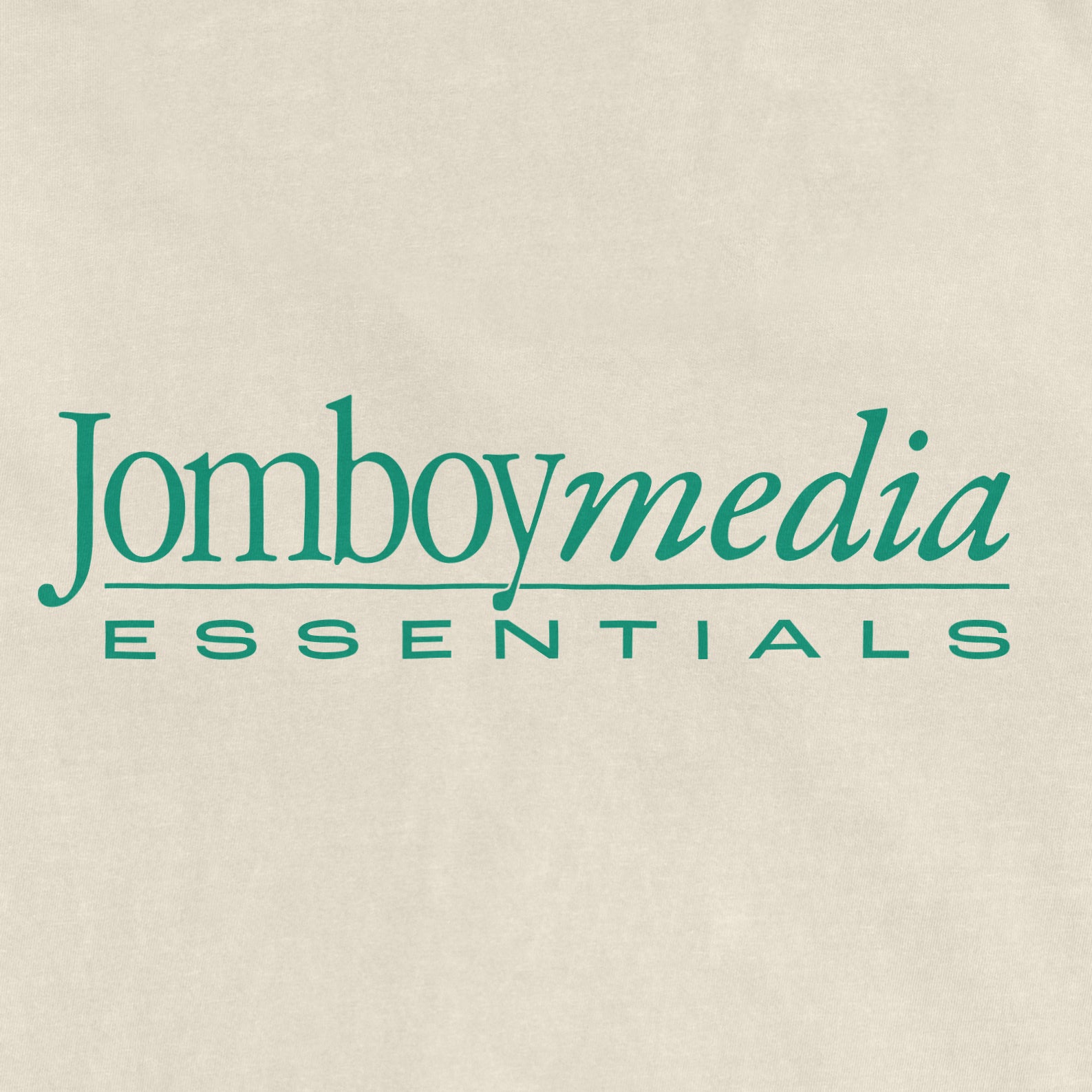 Logo for Jomboy Media Essentials featuring a beige background with green text in a stylish font.