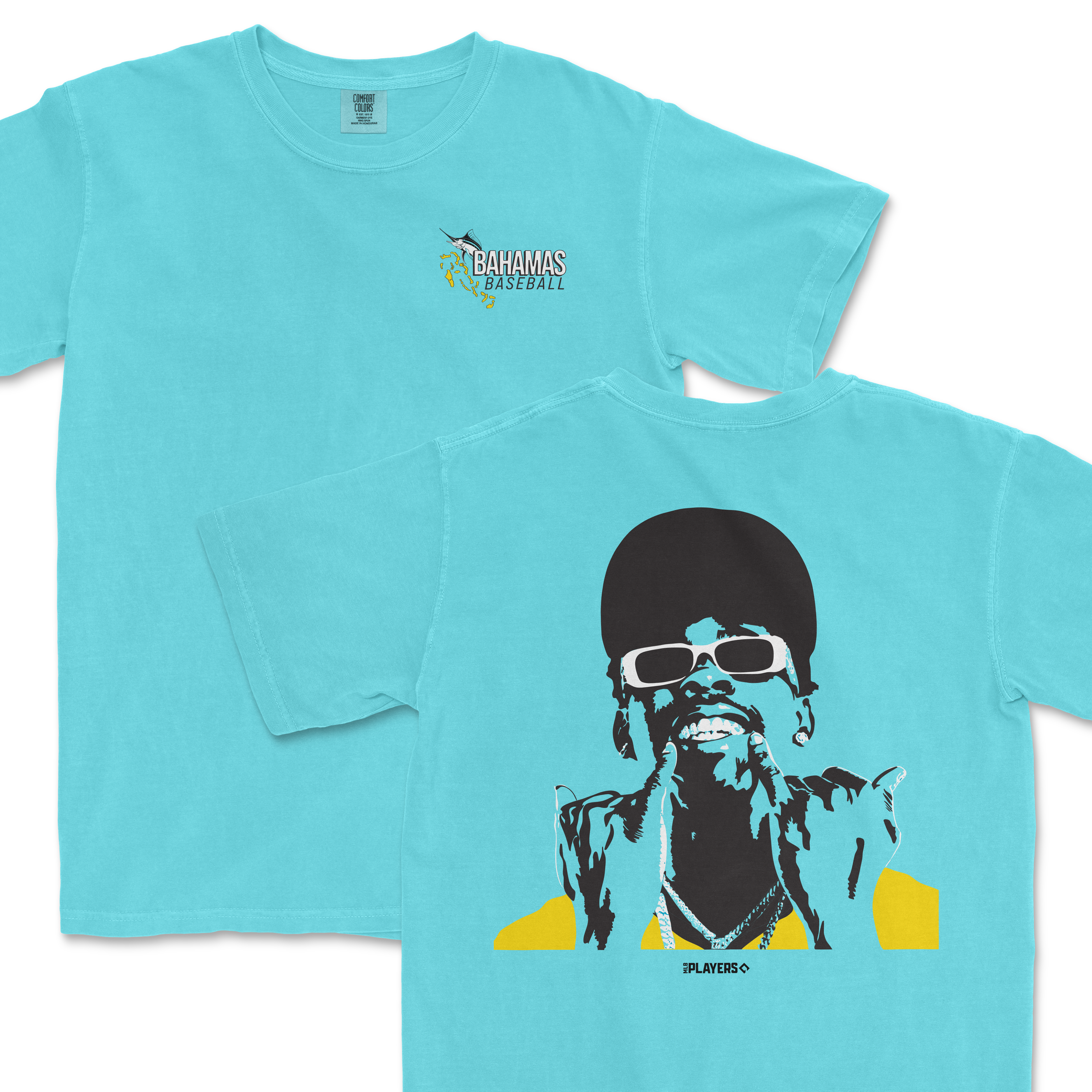 Light blue Comfort Colors T-shirt featuring a Bahamas Baseball logo on the front and a stylized graphic of a woman with sunglasses and braids on the back.