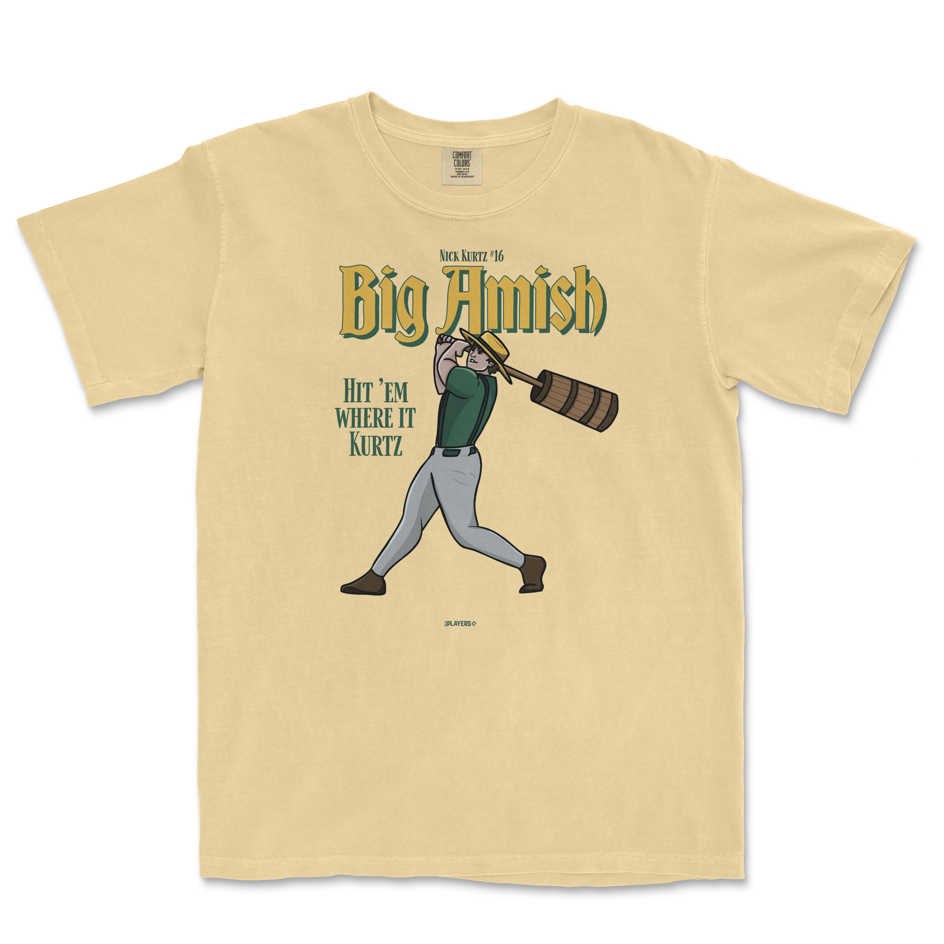 Beige t-shirt featuring a cartoon character swinging a bat with the text "Big Amish" and "Hit 'em where it Kurtz.