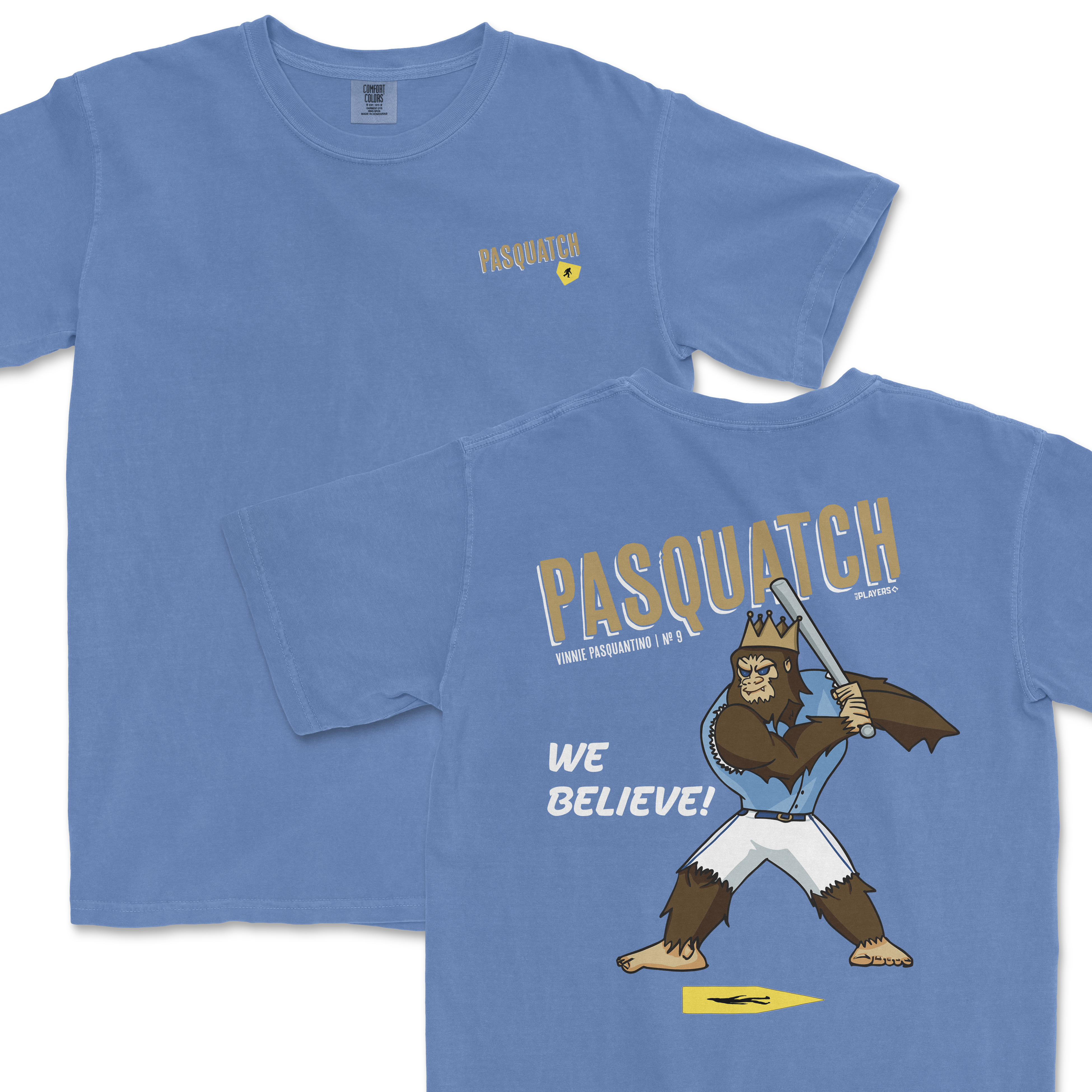 Light blue t-shirt featuring a cartoon Sasquatch holding a sword, with "Pasquatch" and "We Believe" text on the back.