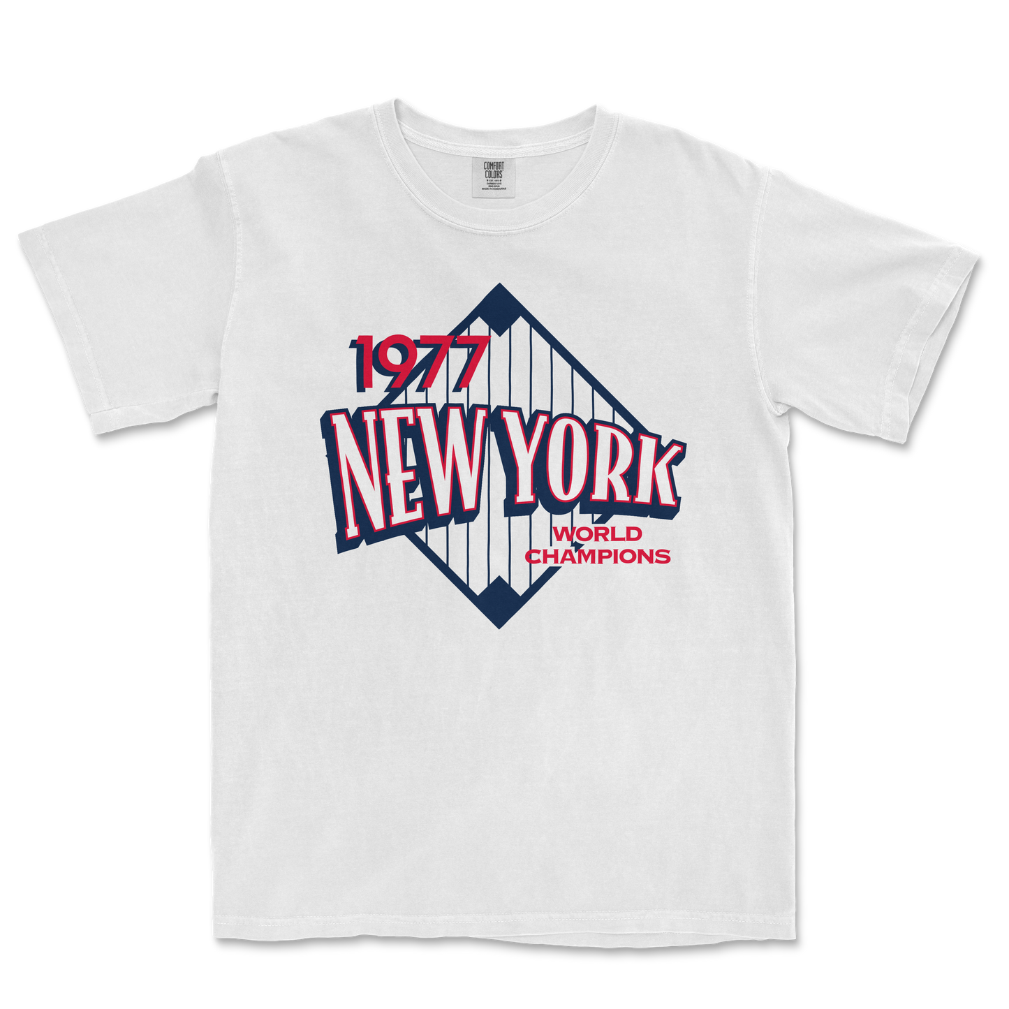White Comfort Colors T-shirt featuring a vintage New York Yankees design with "1977 World Champions" text and a stylized baseball diamond graphic.