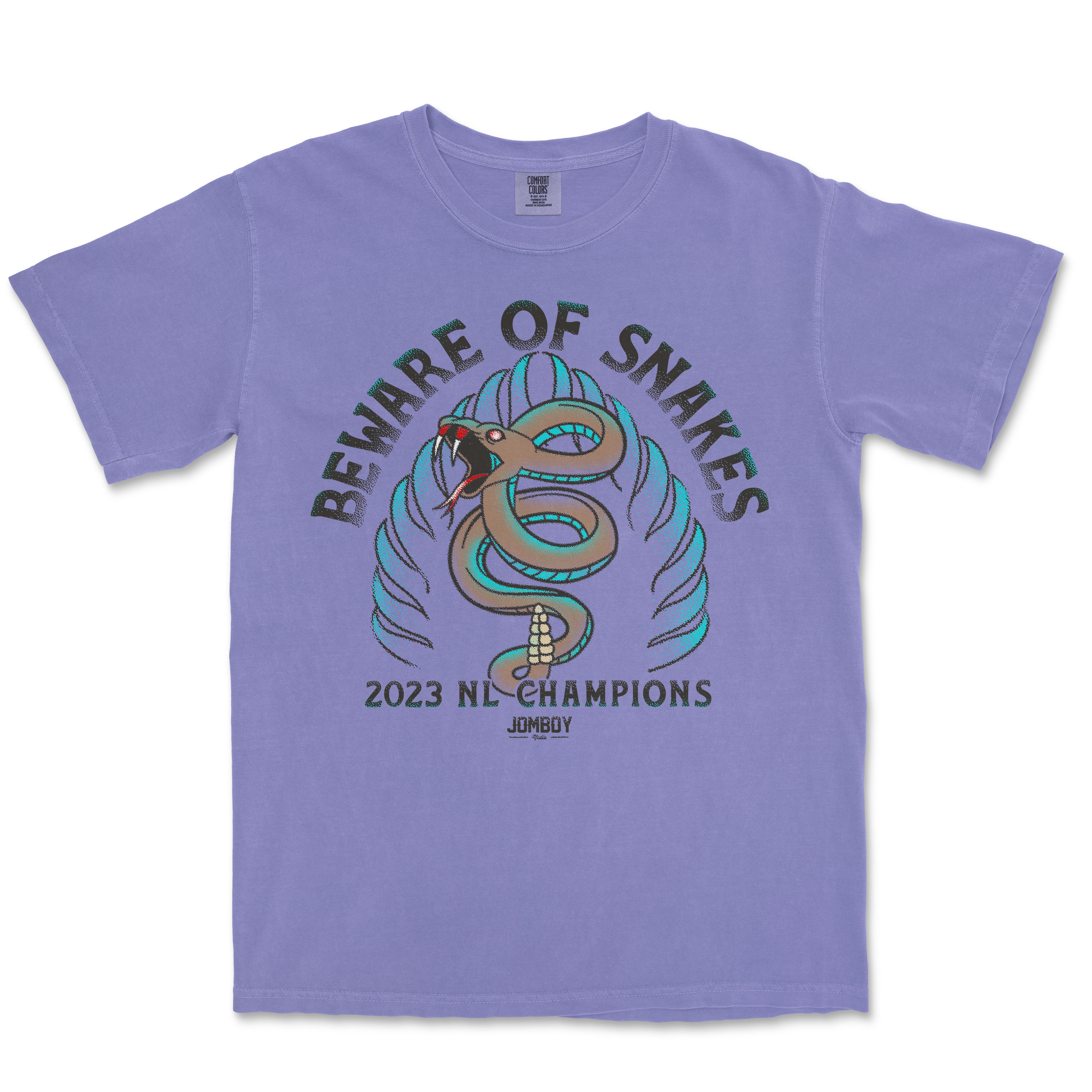 Comfort Colors T-shirt featuring a snake illustration with the text "Beware of Snakes," celebrating 2023 NL Champions.