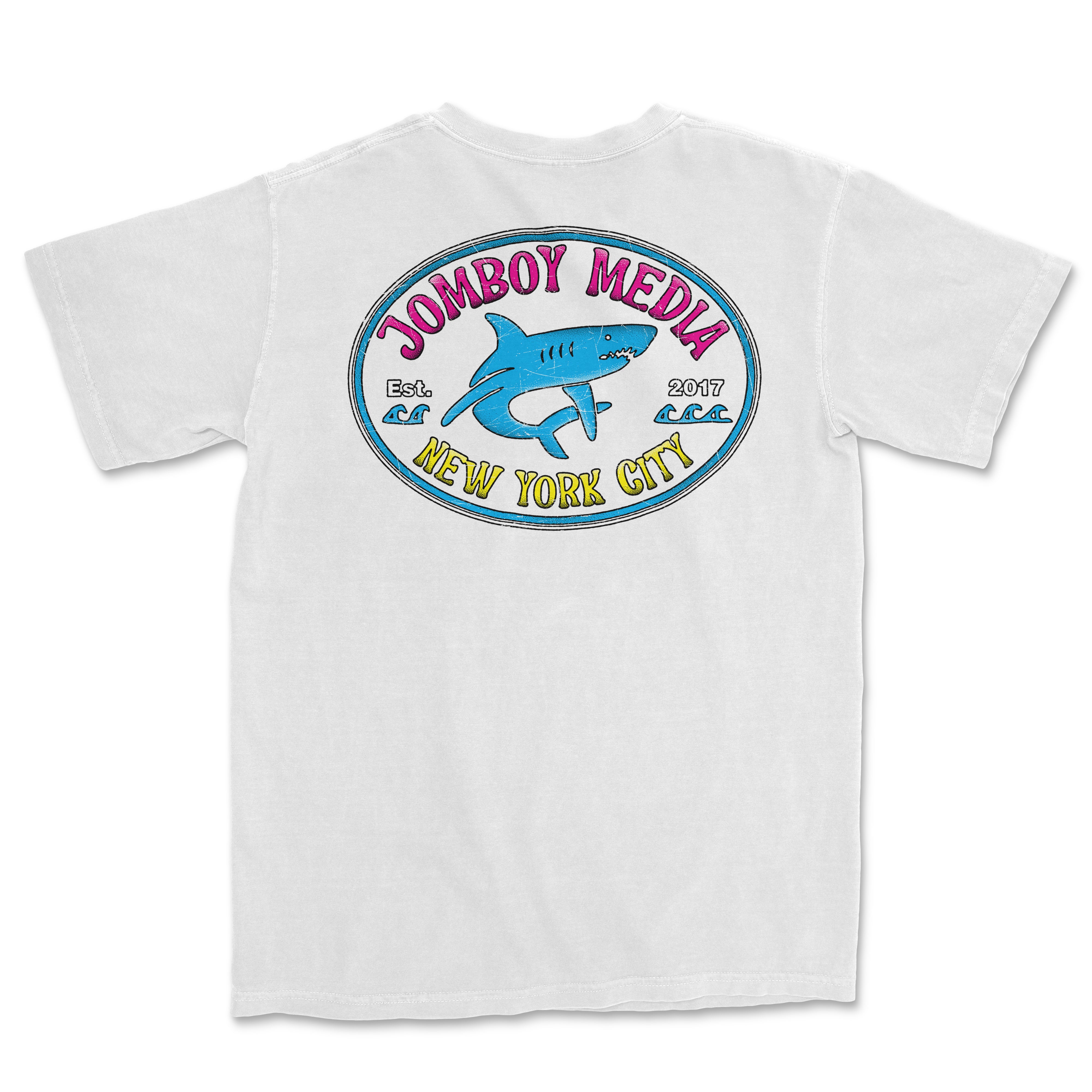White Comfort Colors T-shirt featuring a colorful "Locals Only" design with a shark, "Jombo Boy Media," and "New York City" text.