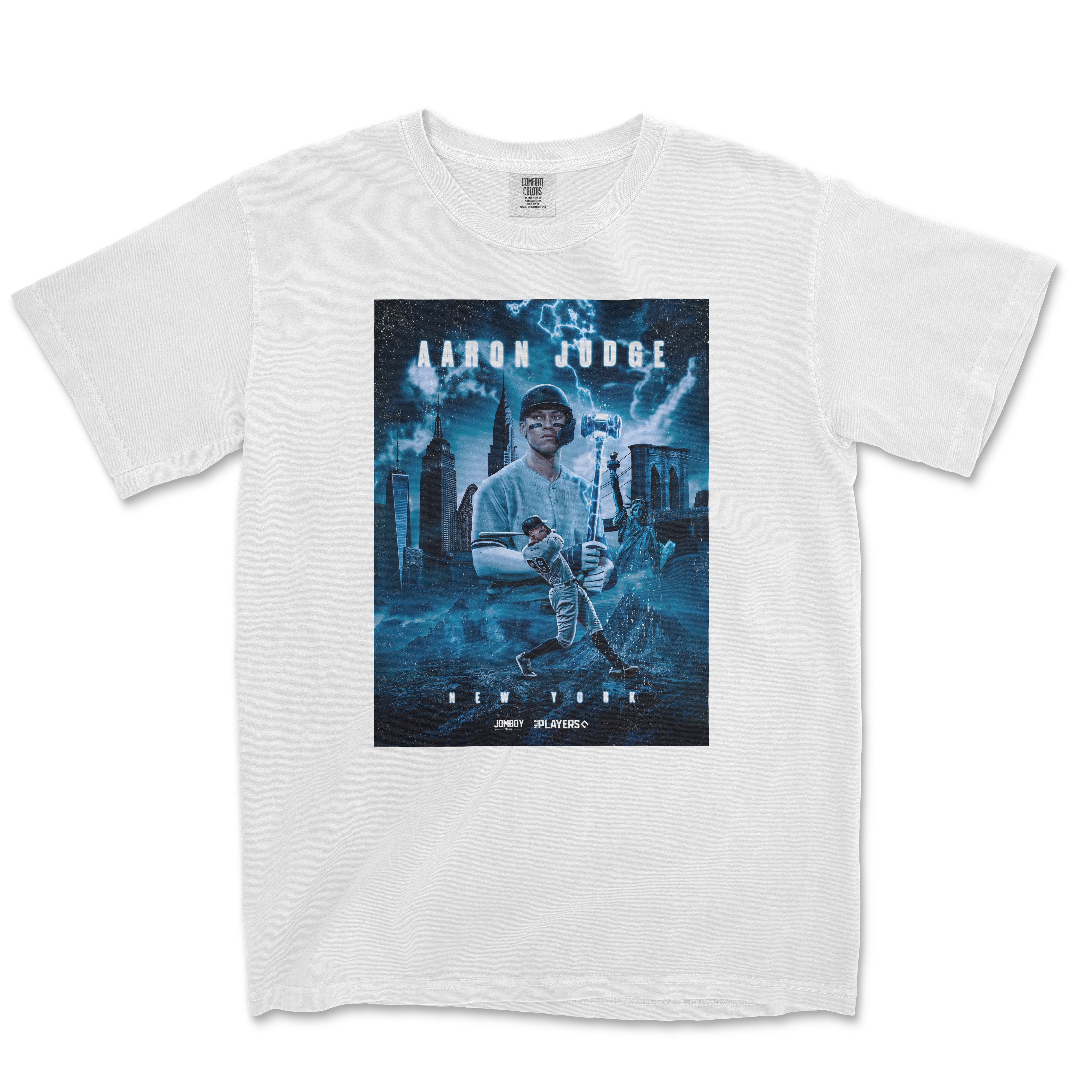 White Comfort Colors T-shirt featuring a graphic design of Aaron Judge as the King of NYC, with cityscape and lightning in the background.