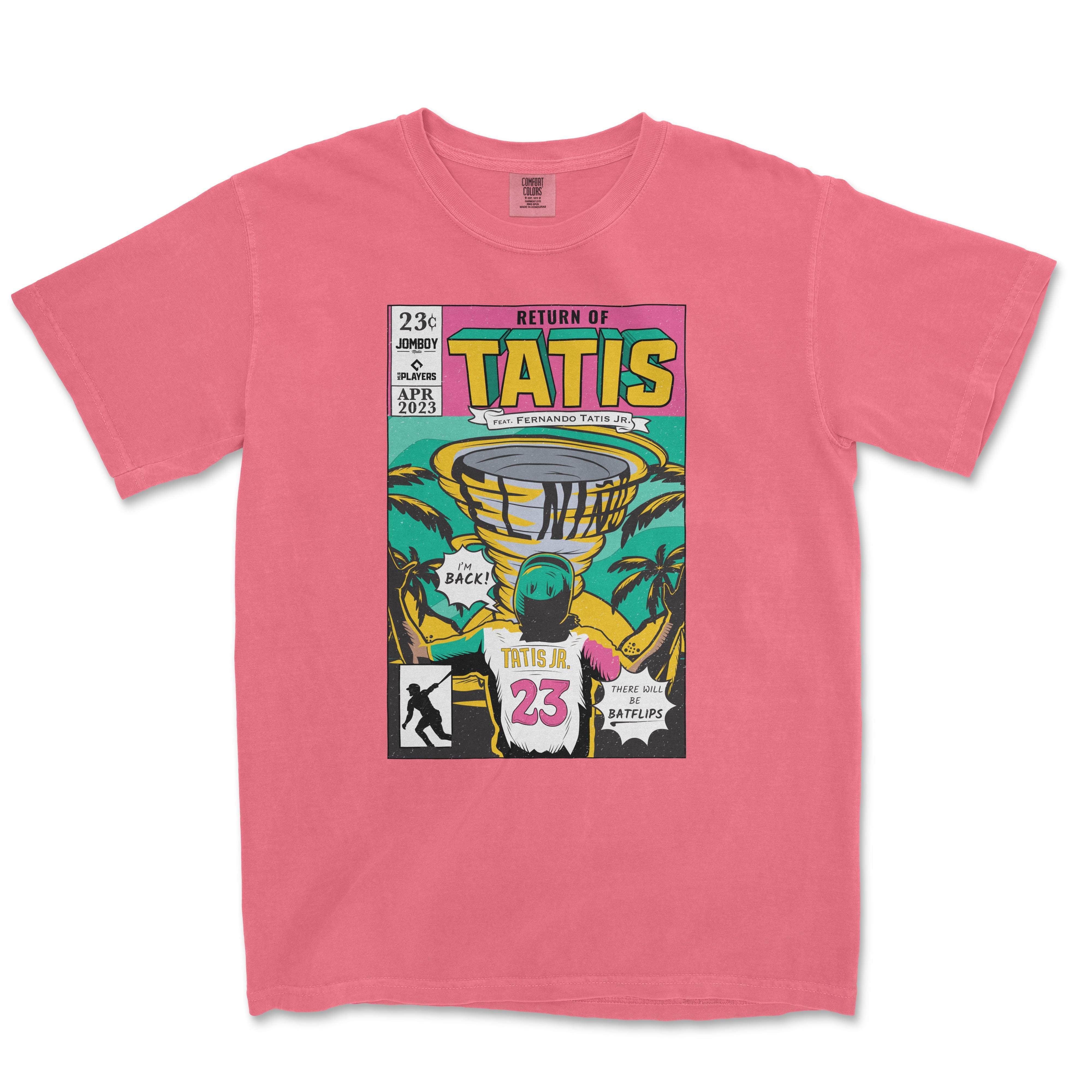 Pink Comfort Colors tee featuring a comic book style print of "Return of Tatis" with illustrations of palm trees, a stadium, and the number 23; designed for Fernando Tatis Jr. fans.