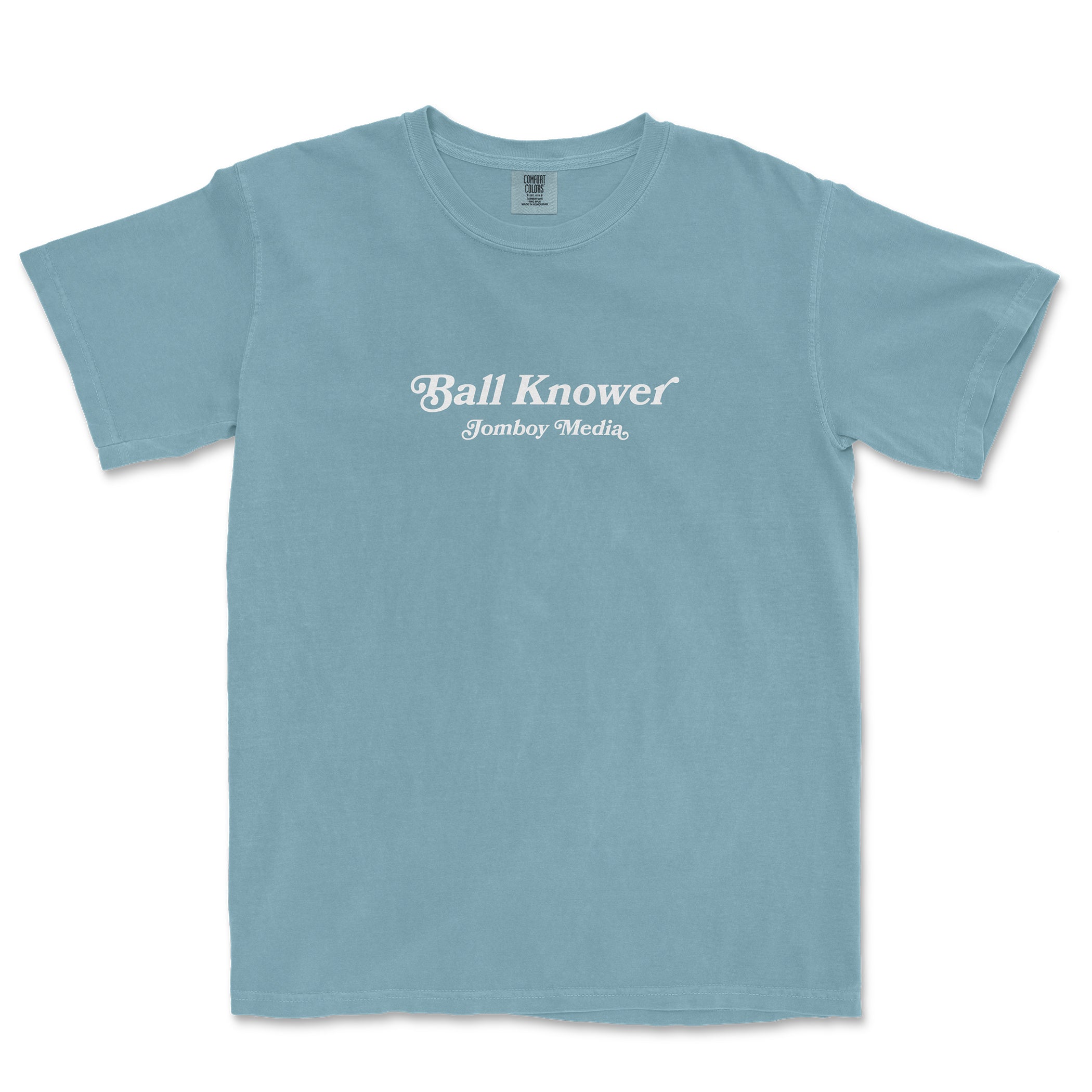 Light blue Comfort Colors T-shirt with white "Ball Knower" and "Jomboy Media" text printed on the front.