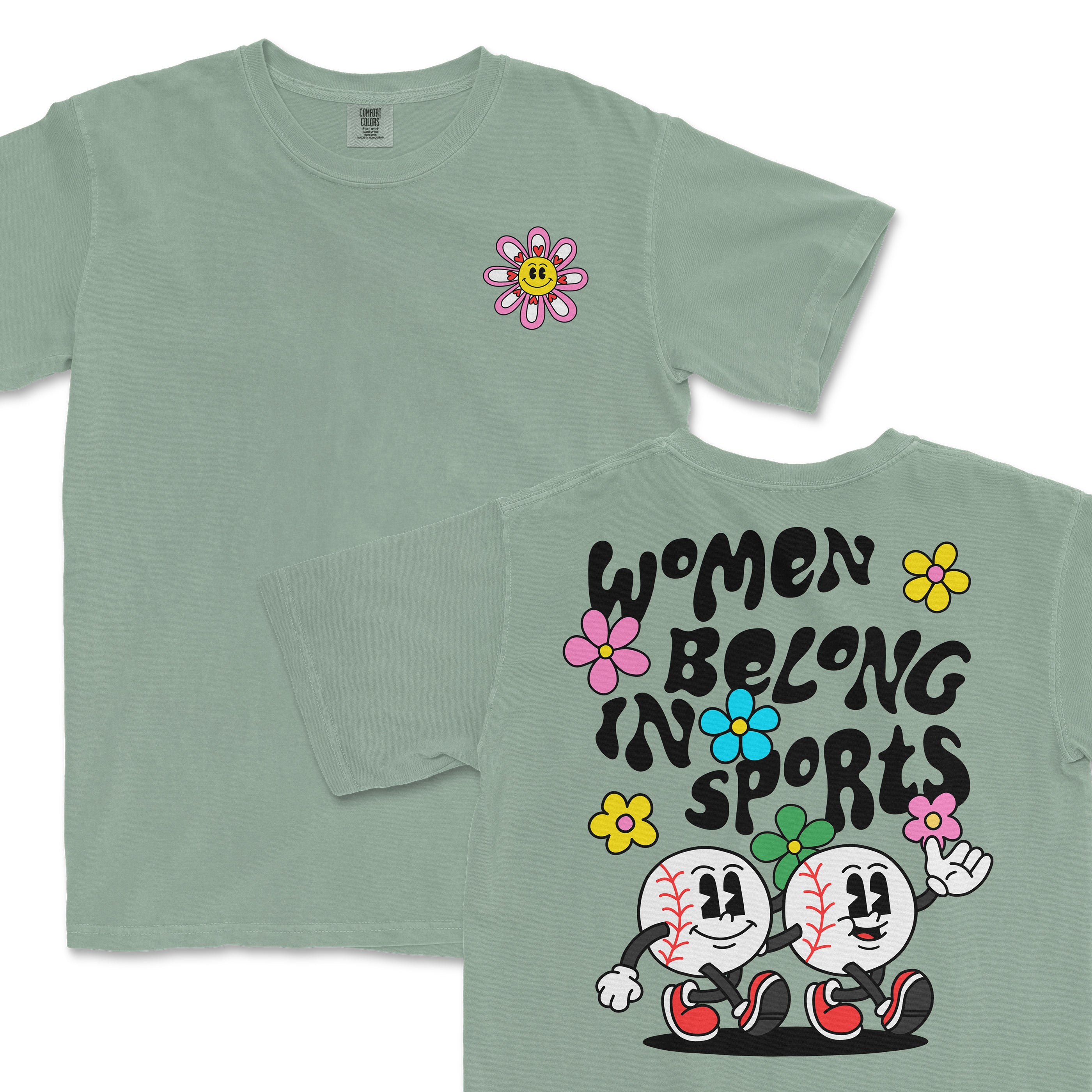 Light green T-shirt featuring a smiling flower graphic on the front and playful "Women Belong in Sports" text with animated baseball characters on the back.