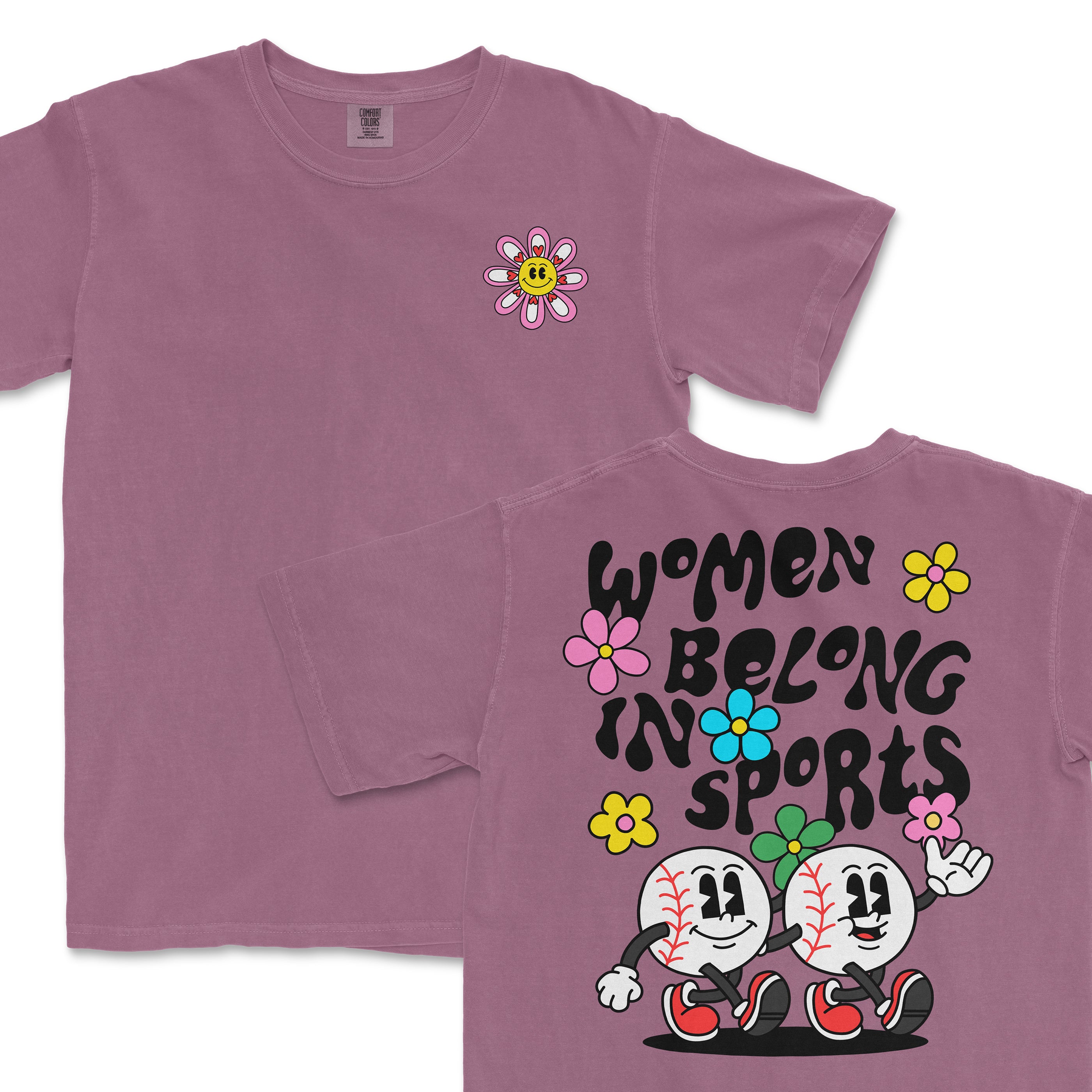 Pink T-shirt featuring a smiling flower graphic on the front and cartoon baseball characters with "Women Belong in Sports" text on the back.