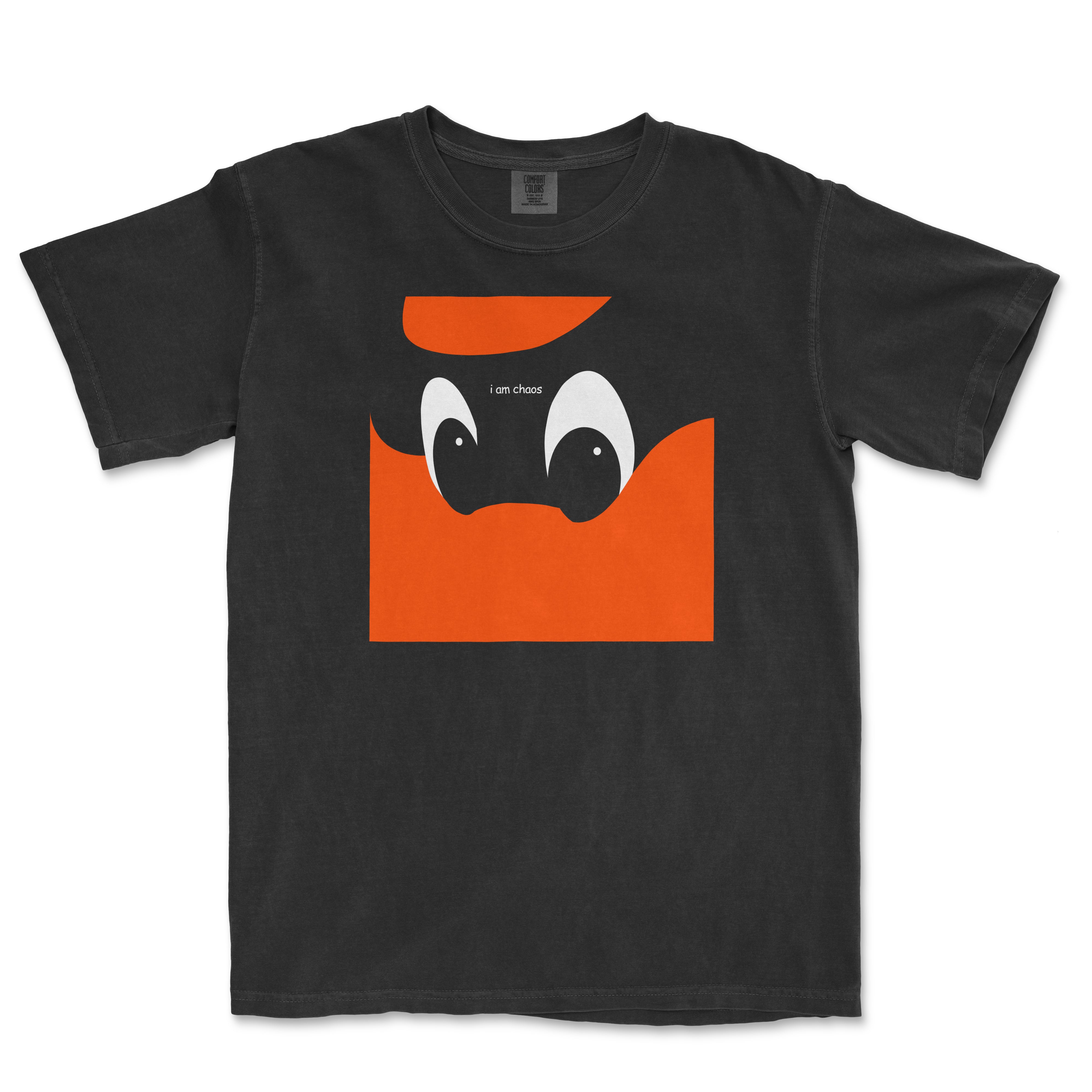 Black Comfort Colors T-shirt featuring a playful cartoon face with large eyes, orange square background, and "I am chaos" text.