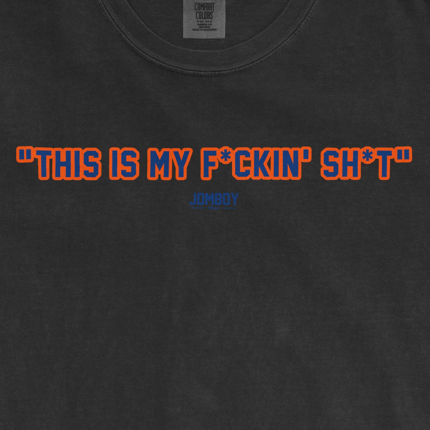 Black T-shirt with bold orange and blue text reading "This is my f*ckin' sh*t" and a small blue "JOMBOY" logo below.