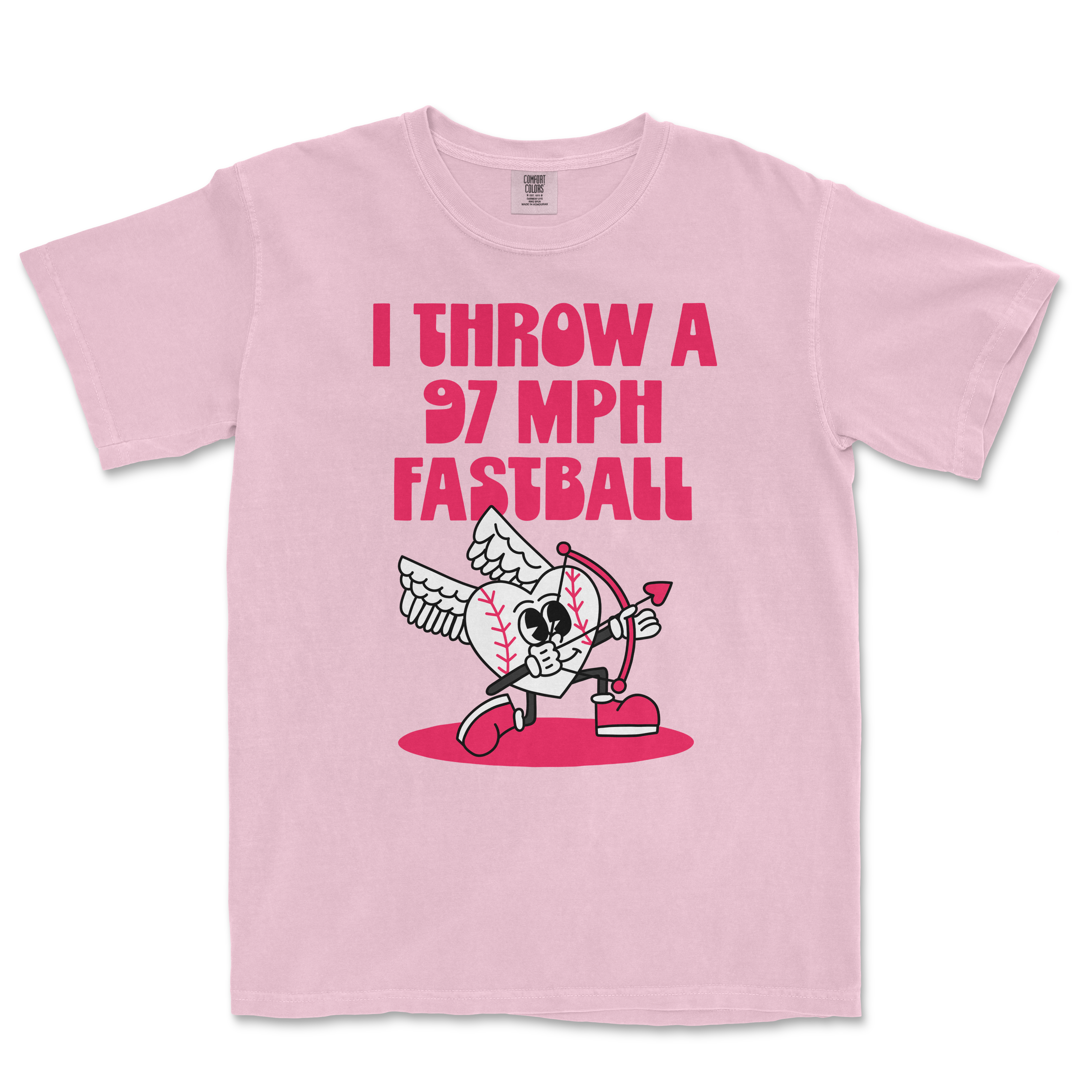 Pink Comfort Colors T-shirt with bold pink text saying "I THROW A 97 MPH FASTBALL" and a cartoon baseball character with wings, a bow and arrow.
