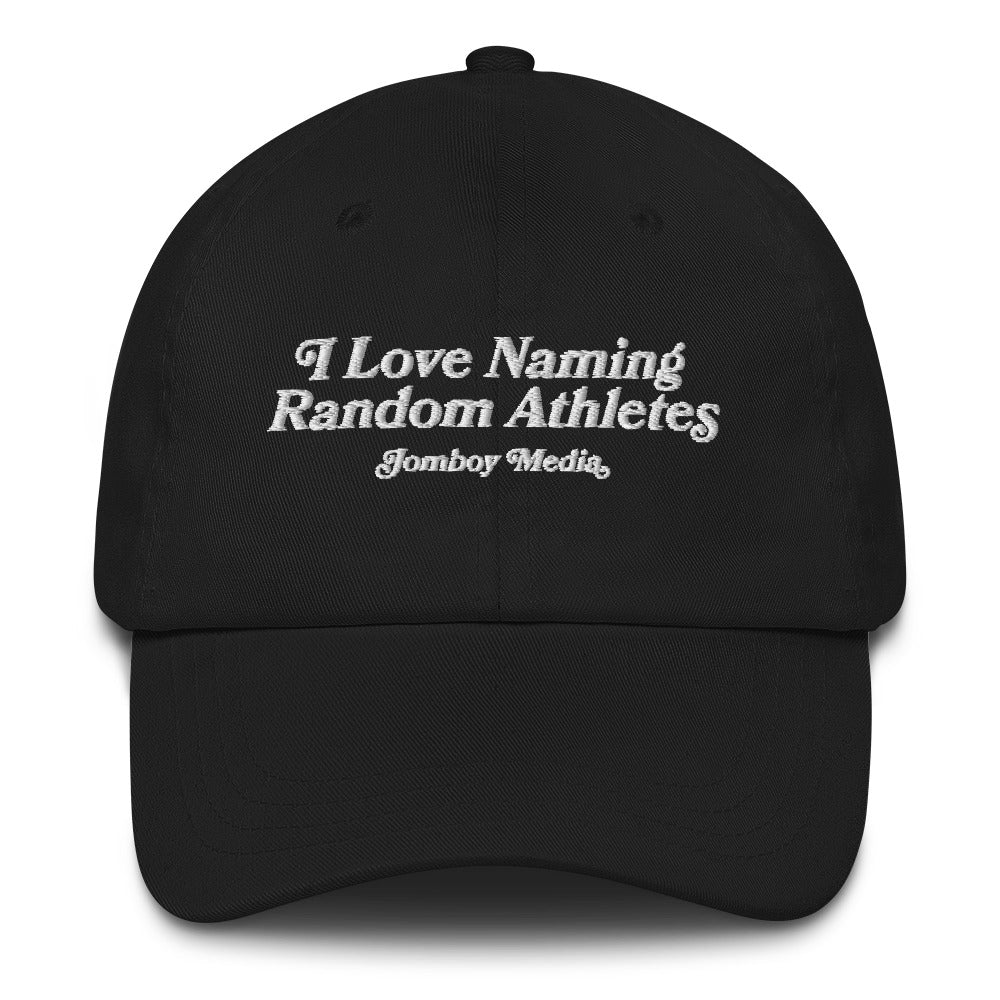 Black dad hat with white embroidered text: "I Love Naming Random Athletes" and "Jombay Media" underneath.