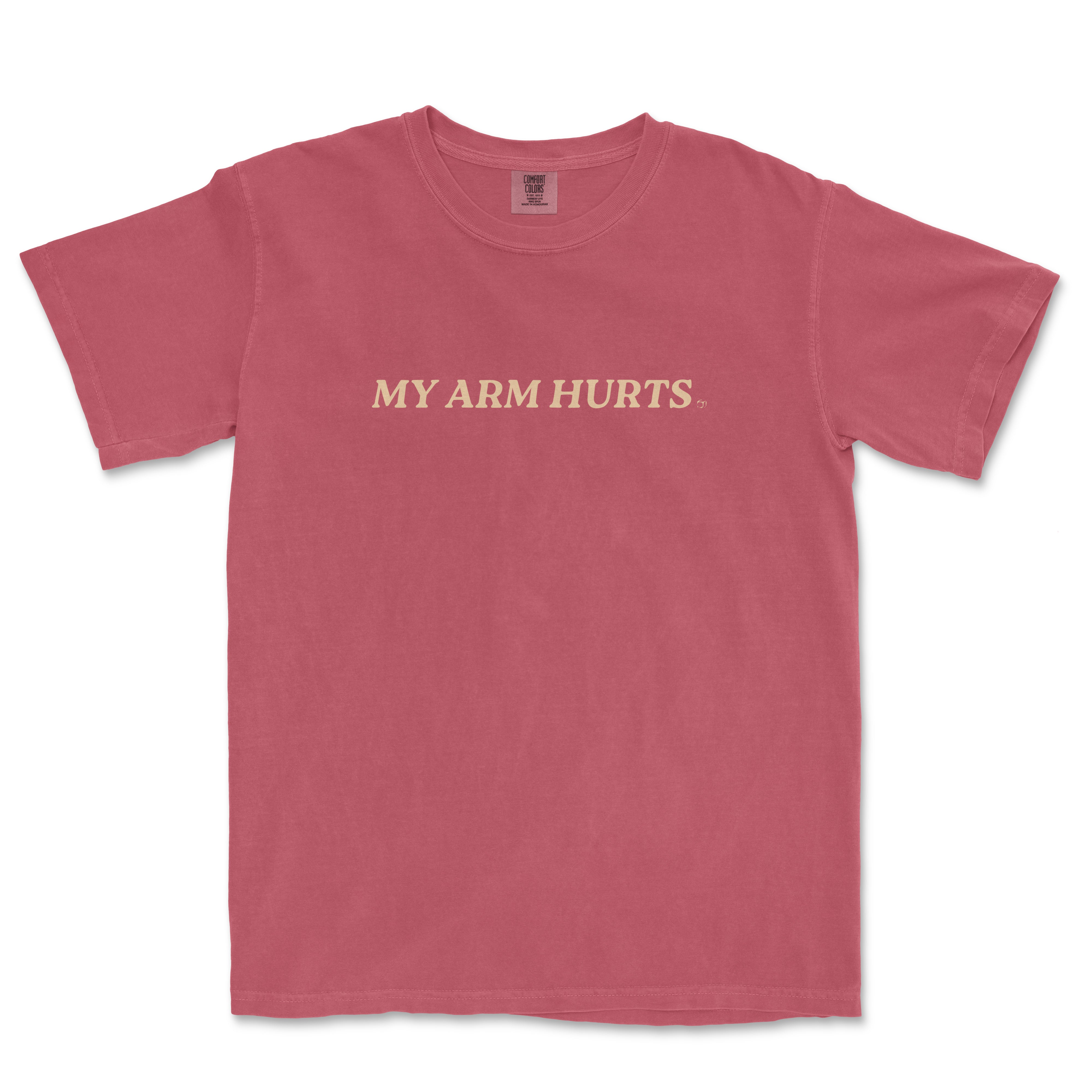 Pink vintage Comfort Colors® tee with the phrase "MY ARM HURTS" in cream-colored text across the front.