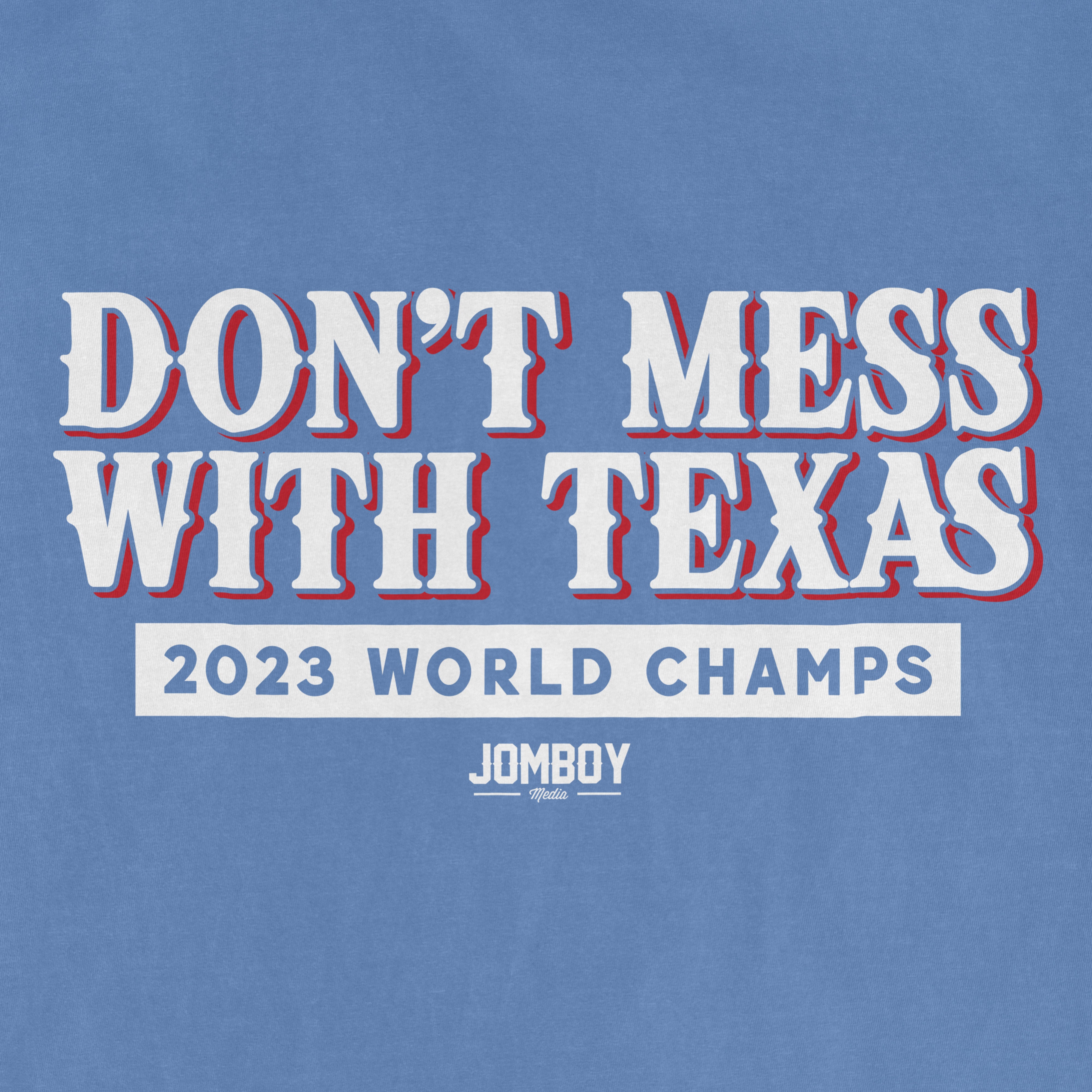 Blue Comfort Colors T-shirt with white and red text reading "Don't Mess With Texas," "2023 World Champs," and "Jombo Media.