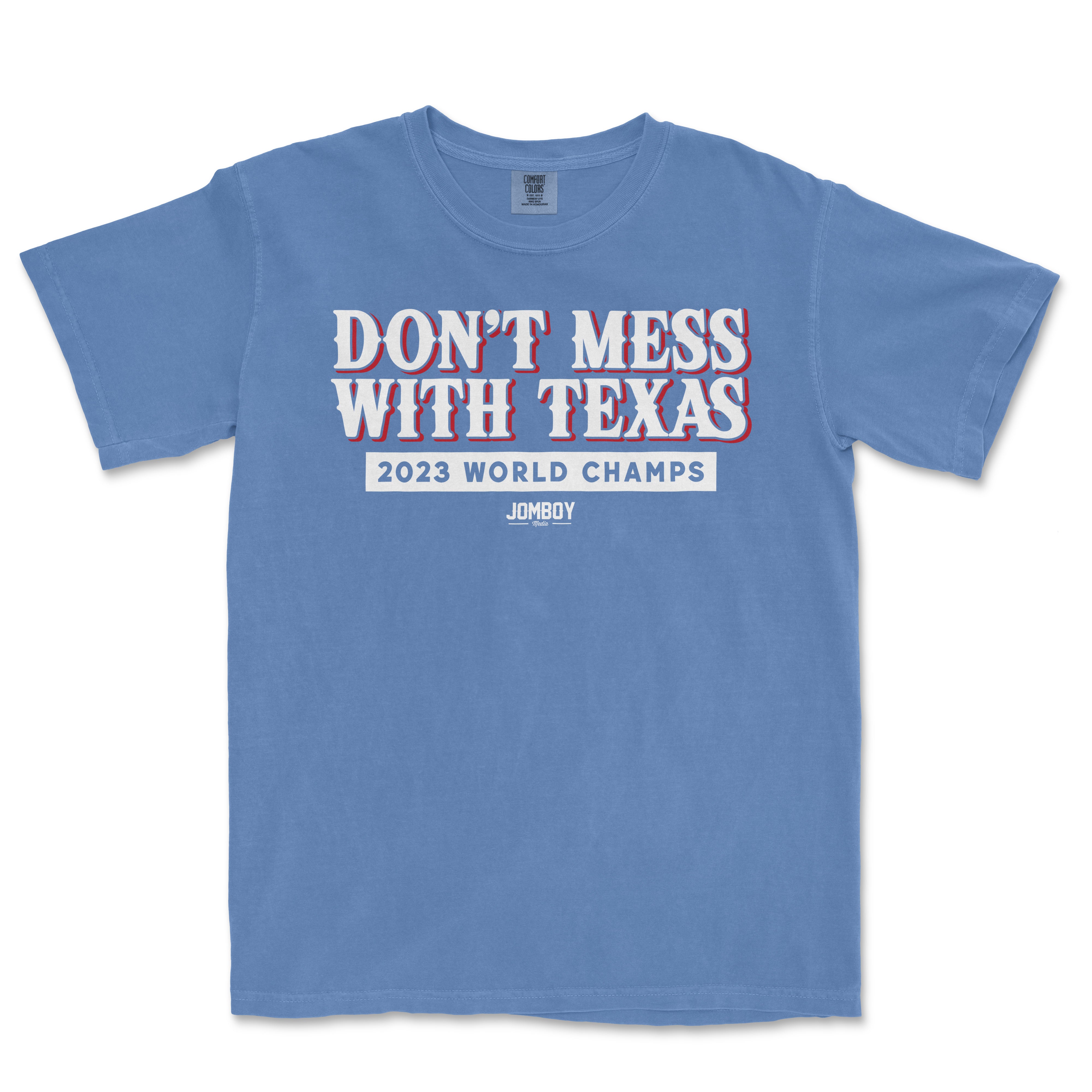 Blue Comfort Colors T-shirt with bold white and red text reading "Don't Mess With Texas," celebrating the 2023 World Champs.