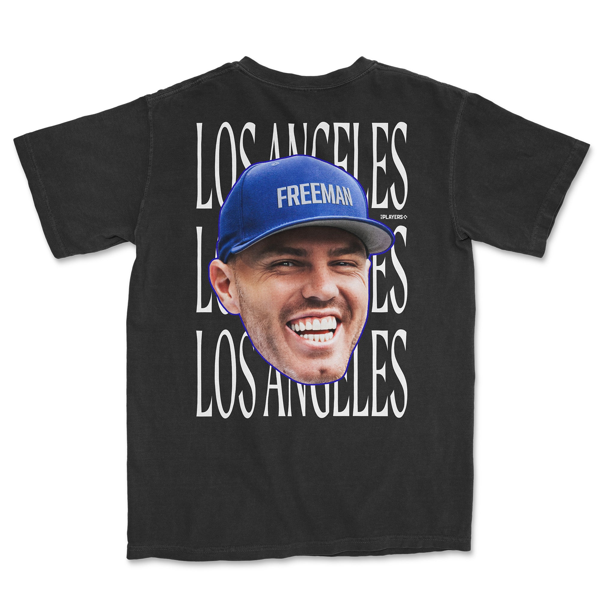 Freddie Freeman Head in the Game Series alternate t-shirt featuring a large smiling graphic and "Los Angeles" text on the back.
