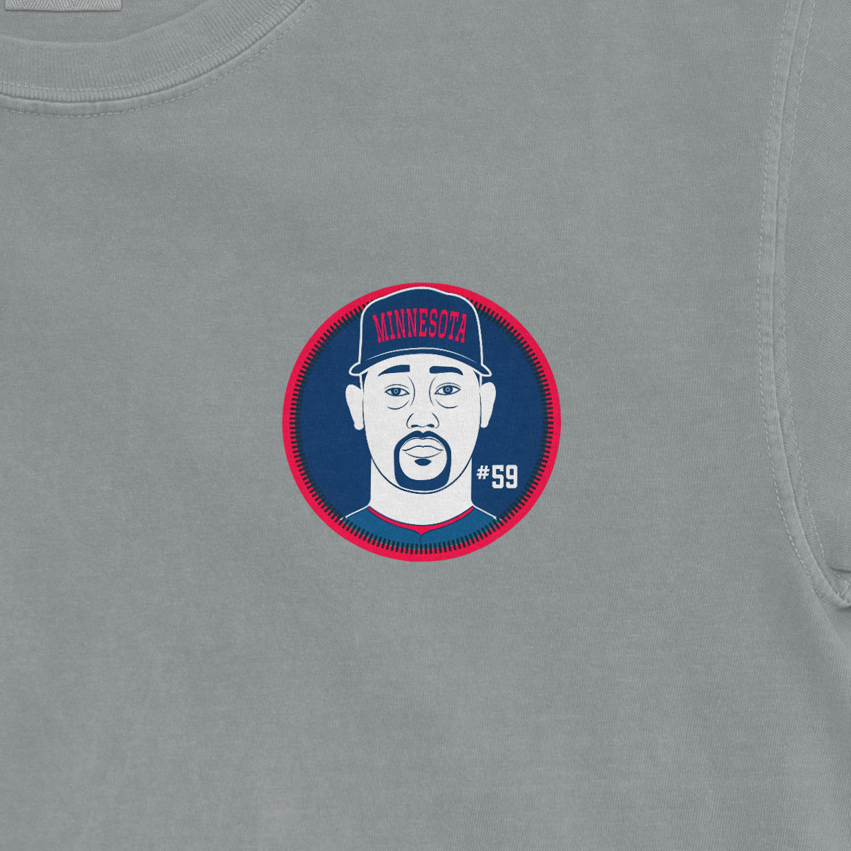 Comfort Colors tee featuring a graphic of Jhoan Duran with a Minnesota cap, #59, on a gray background.