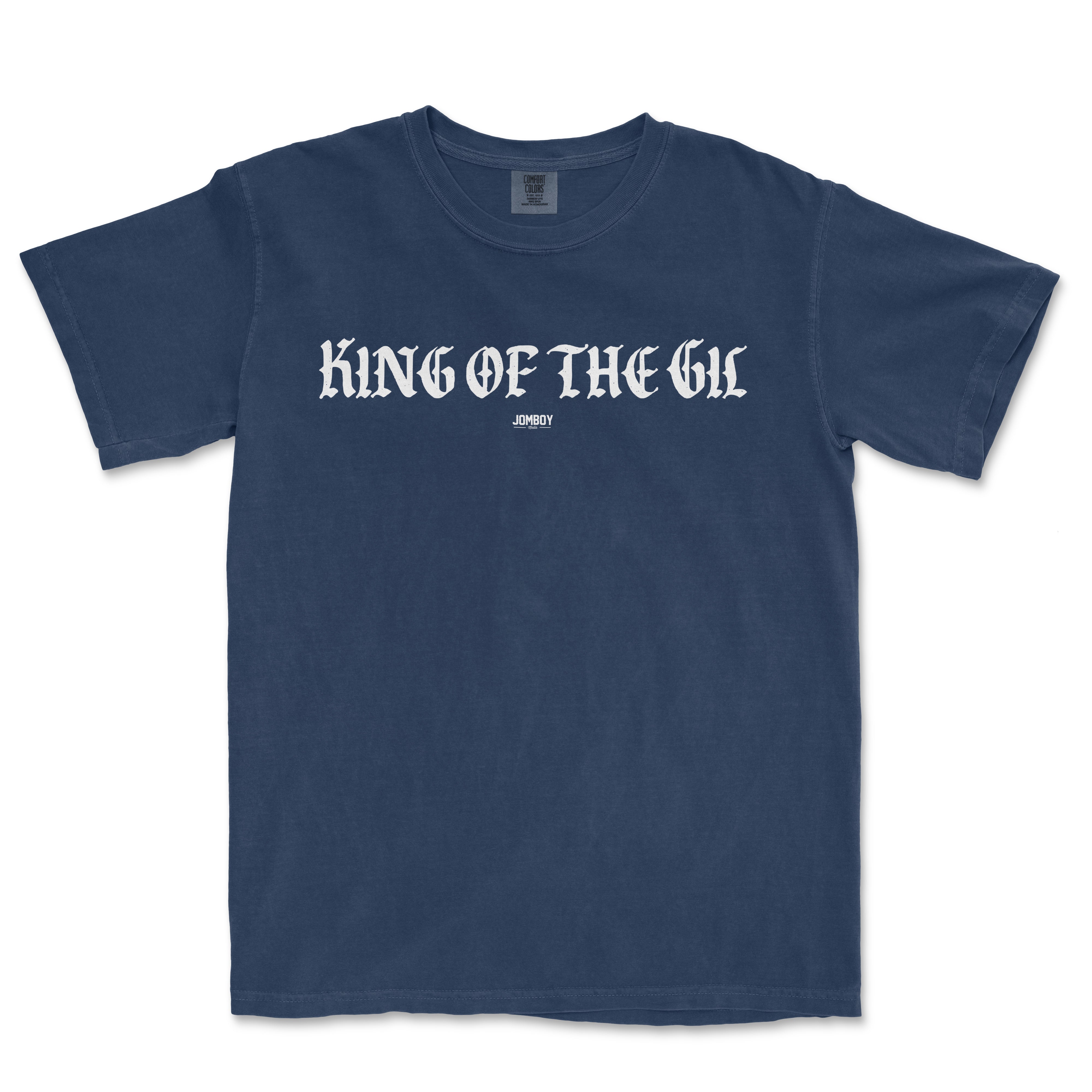 Comfort Colors navy T-shirt with "KING OF THE GIL" in gothic font and small "JOMBOY" logo below.