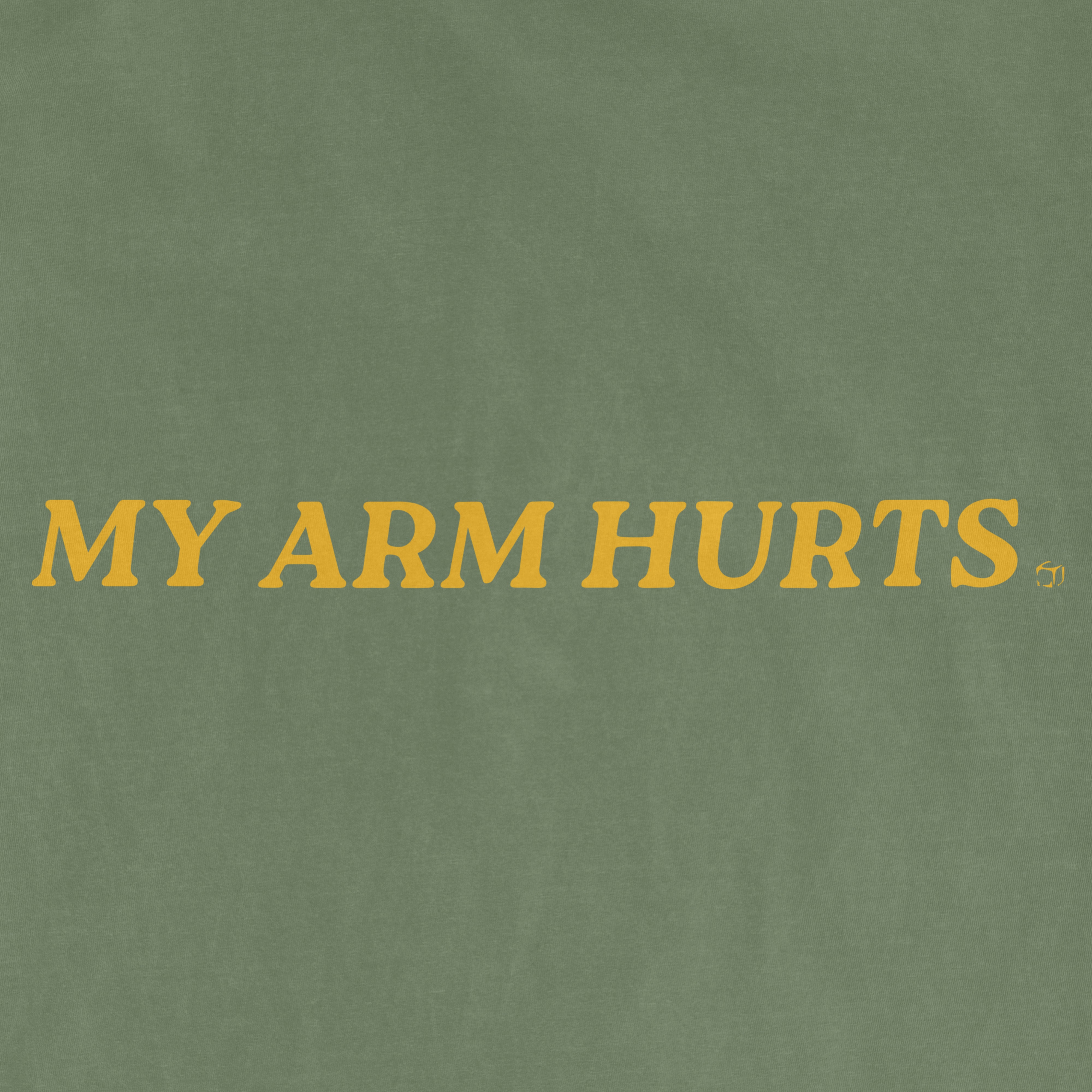 Green vintage tee with yellow text that reads "MY ARM HURTS" in bold, capital letters.