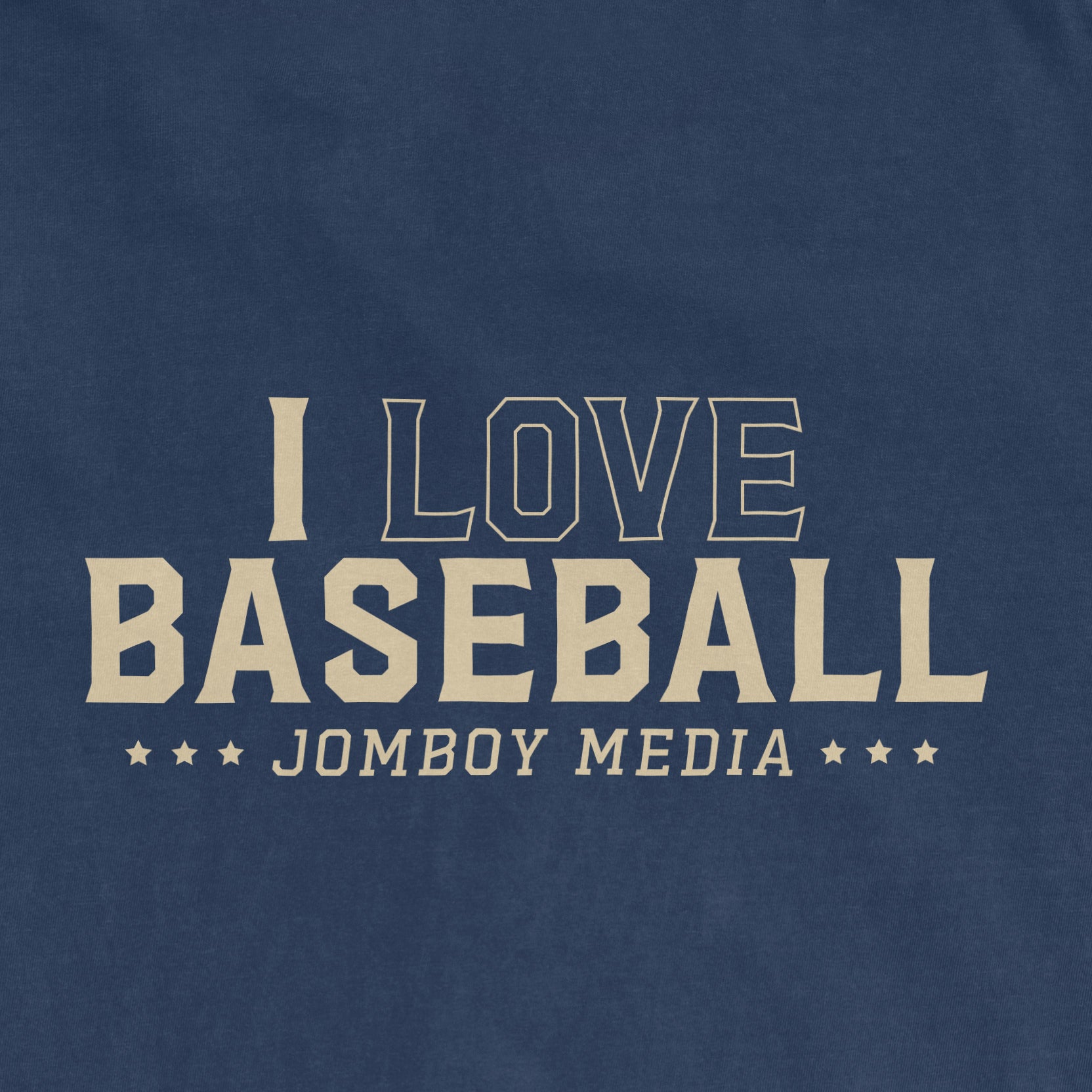 Blue vintage T-shirt with white text that reads "I LOVE BASEBALL" and "JOMBOY MEDIA" below, featuring star accents.