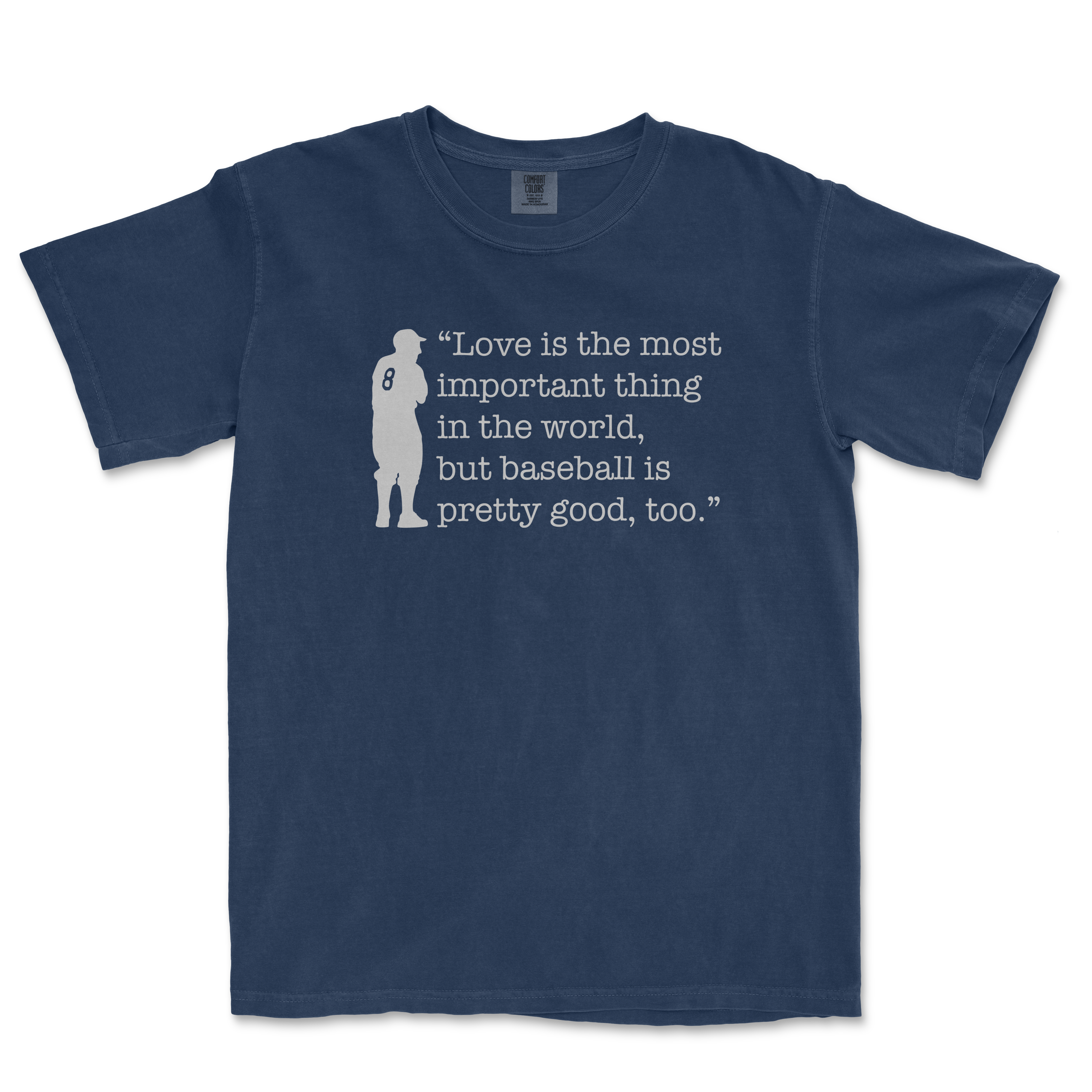 Blue Comfort Colors T-shirt featuring a silhouette of a baseball player and the quote: "Love is the most important thing in the world, but baseball is pretty good, too.