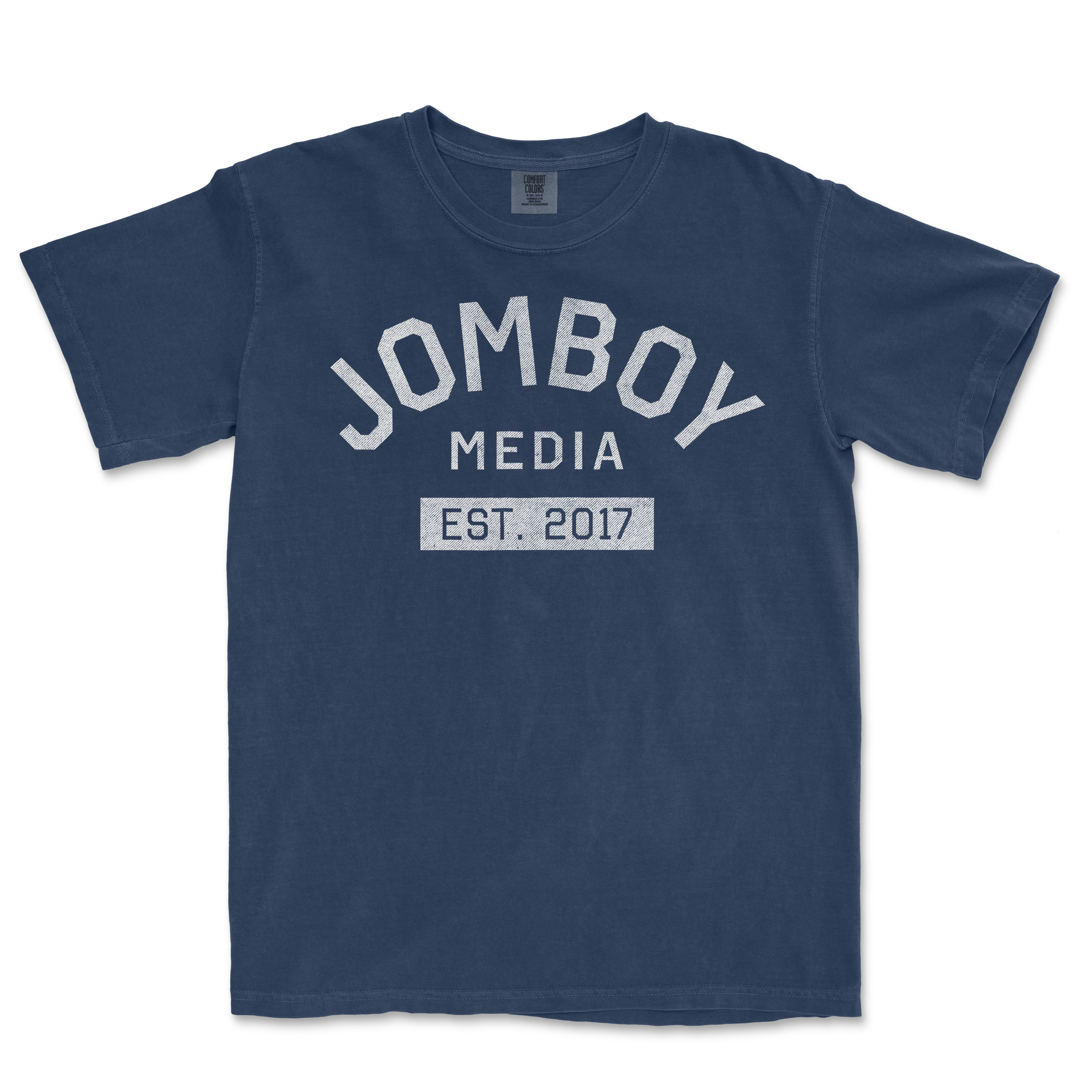 Blue Comfort Colors T-shirt with "Jomboy Media Est. 2017" printed in white, vintage-style text on the front.