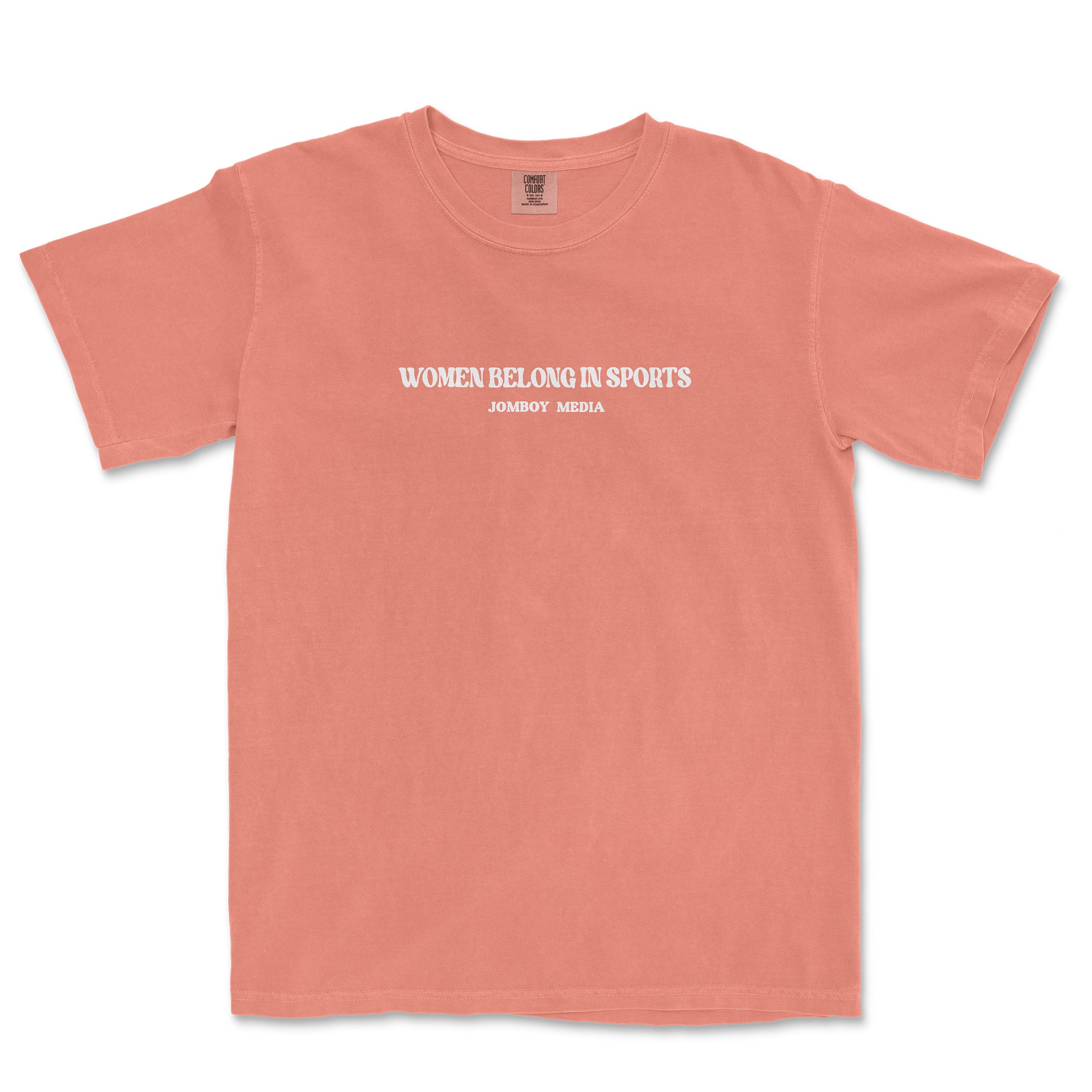 Pink T-shirt with white text that reads "Women Belong in Sports" and "JomboY Media" underneath, promoting women in sports.