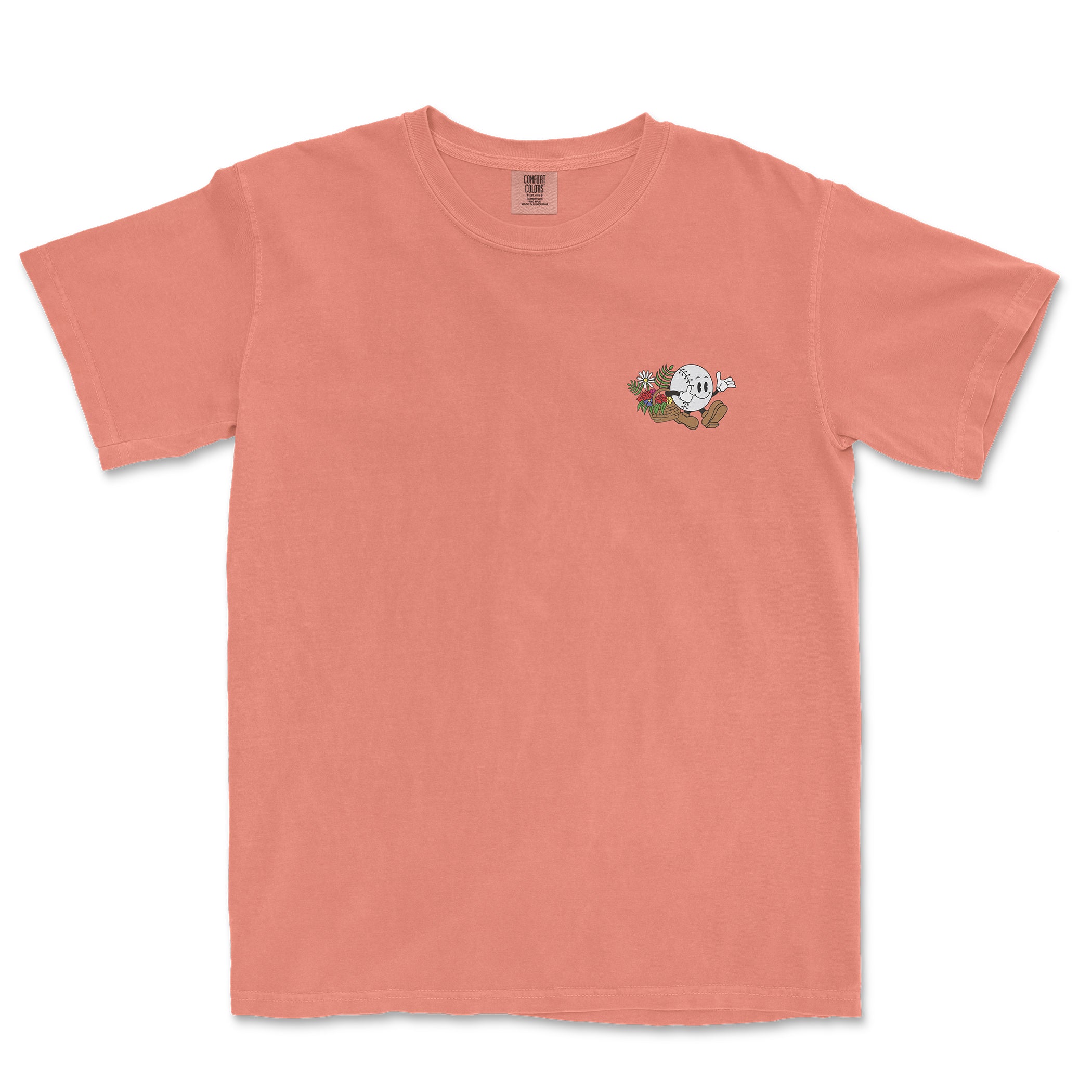 Pink Comfort Colors tee featuring a small baseball girl graphic with flowers and a glove on the chest.