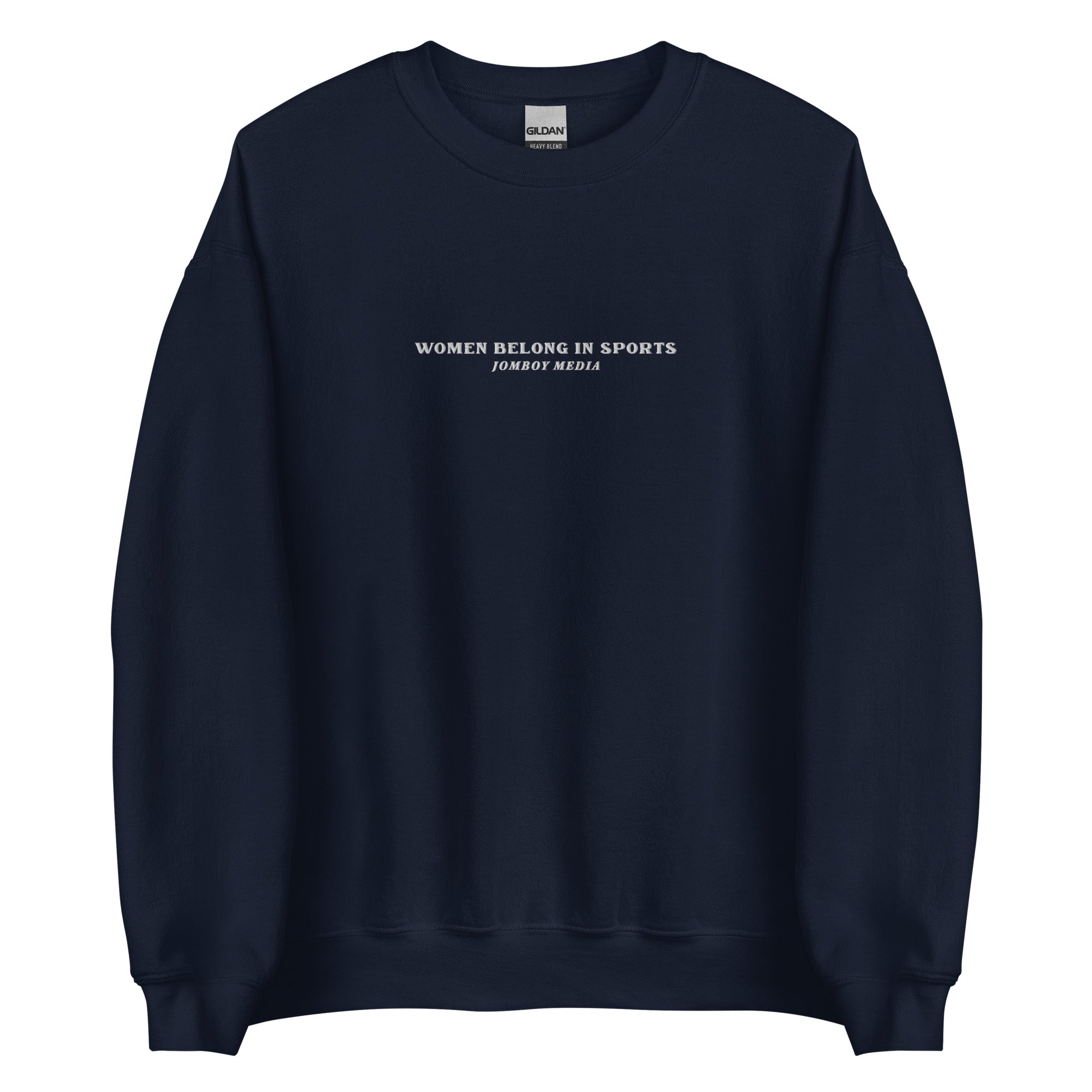 Navy crewneck sweatshirt with embroidered text "Women Belong in Sports" and "Jombo Media" below, featuring long sleeves and ribbed cuffs.