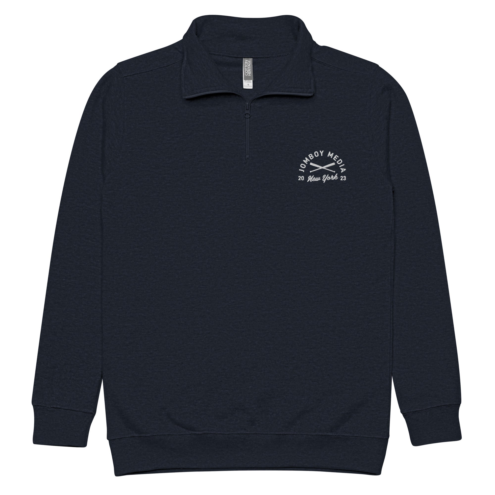 Navy fleece quarter zip sweatshirt featuring the JM Coat of Arms logo with "Jomboy Media" and "New York 23" embroidered on the chest.