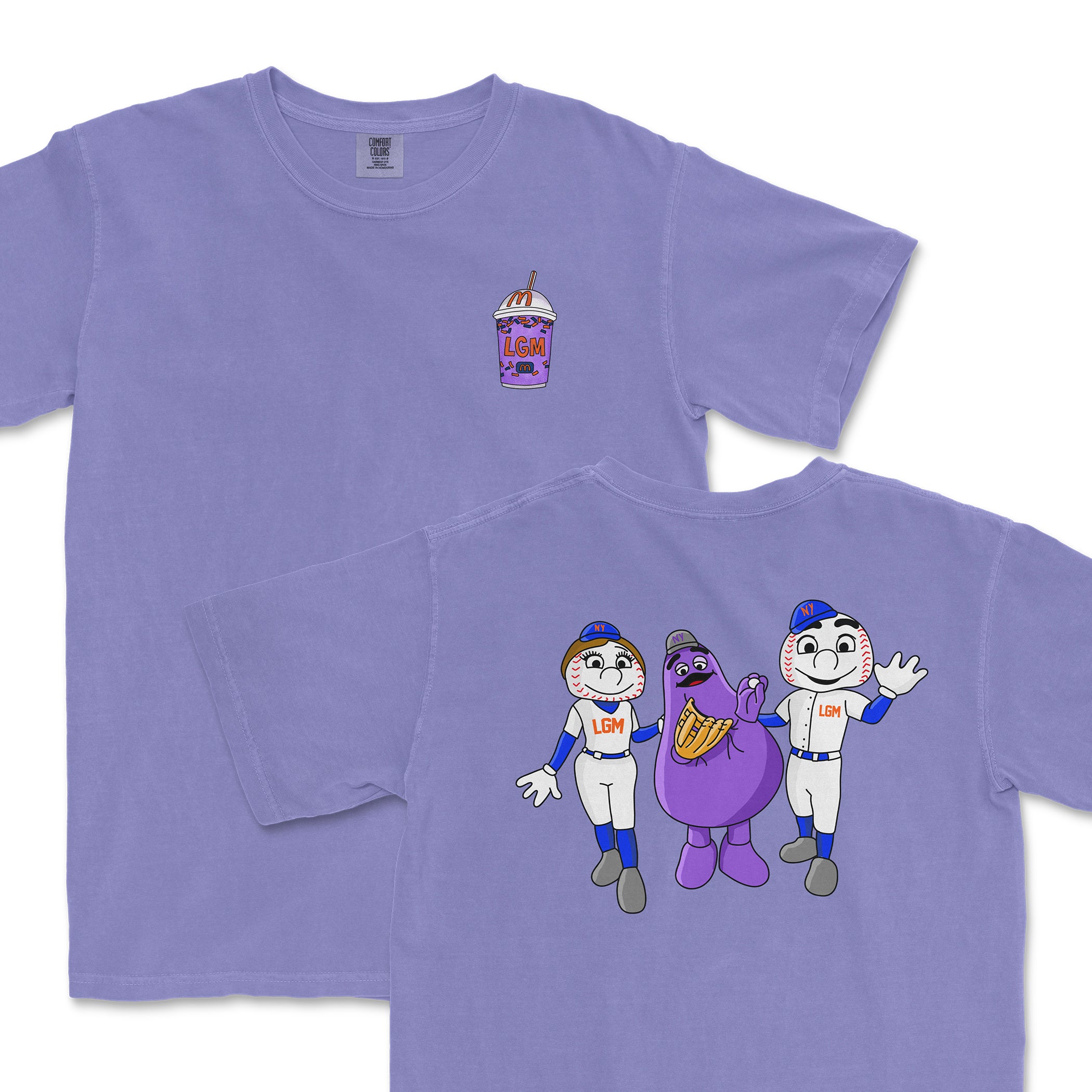 Lavender Comfort Colors T-shirt featuring "NYM AND FRIENDS" cartoon characters, baseball theme, and a purple beverage illustration.
