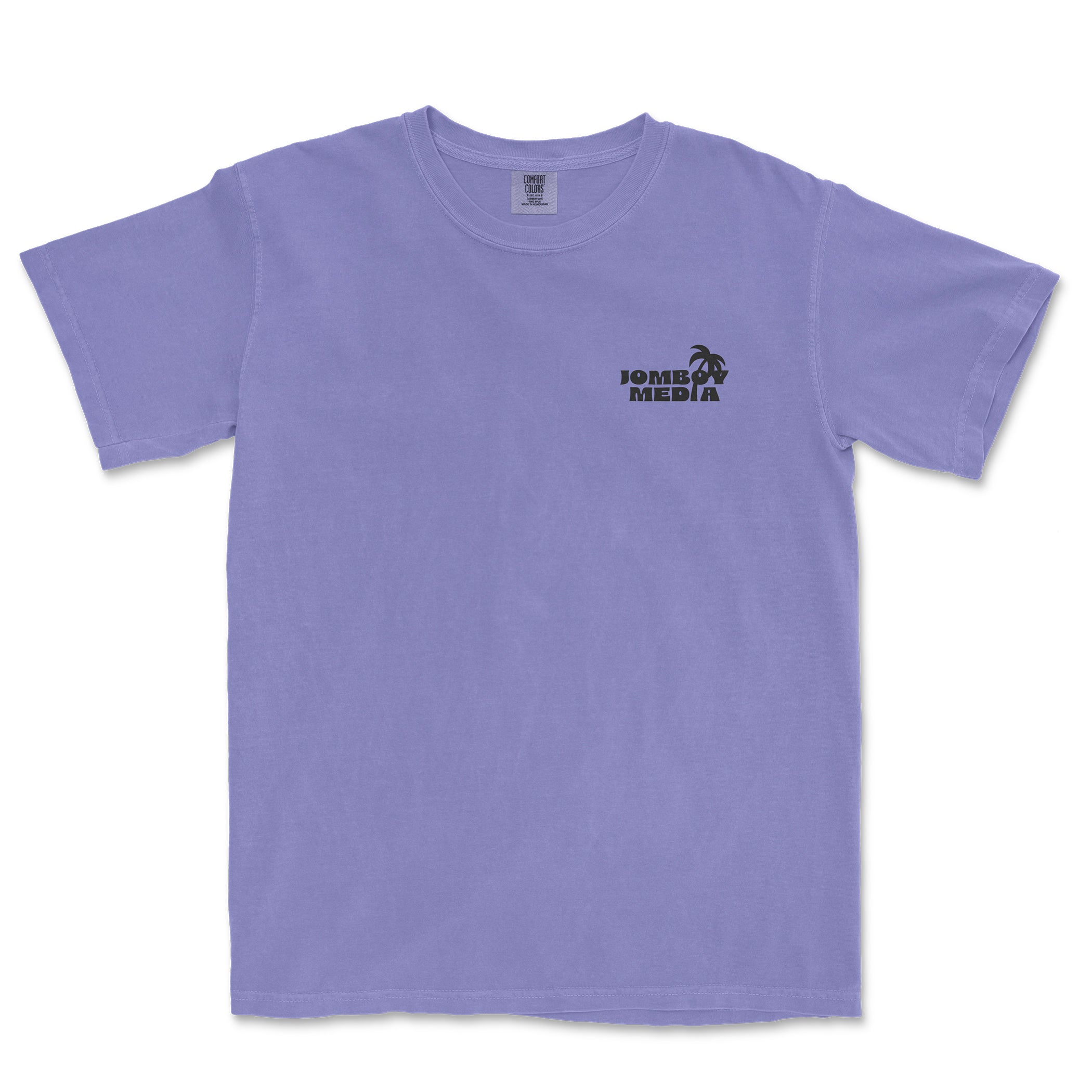 Comfort Colors lavender T-shirt featuring a small black "Jombo Media" logo with a palm tree on the upper left chest.