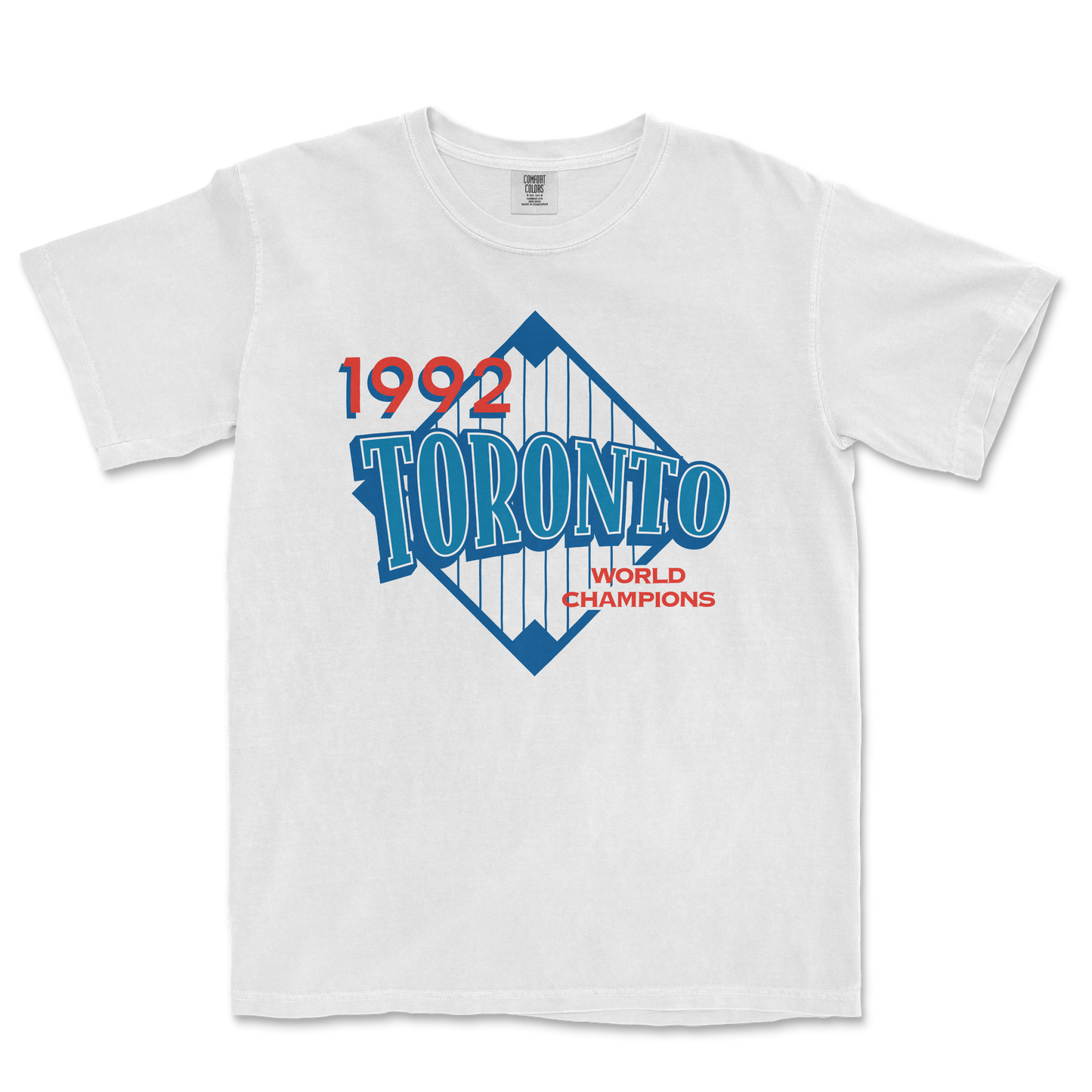 White T-shirt featuring a vintage Toronto 1992 World Champions graphic with blue, red, and white colors and a diamond-shaped design.