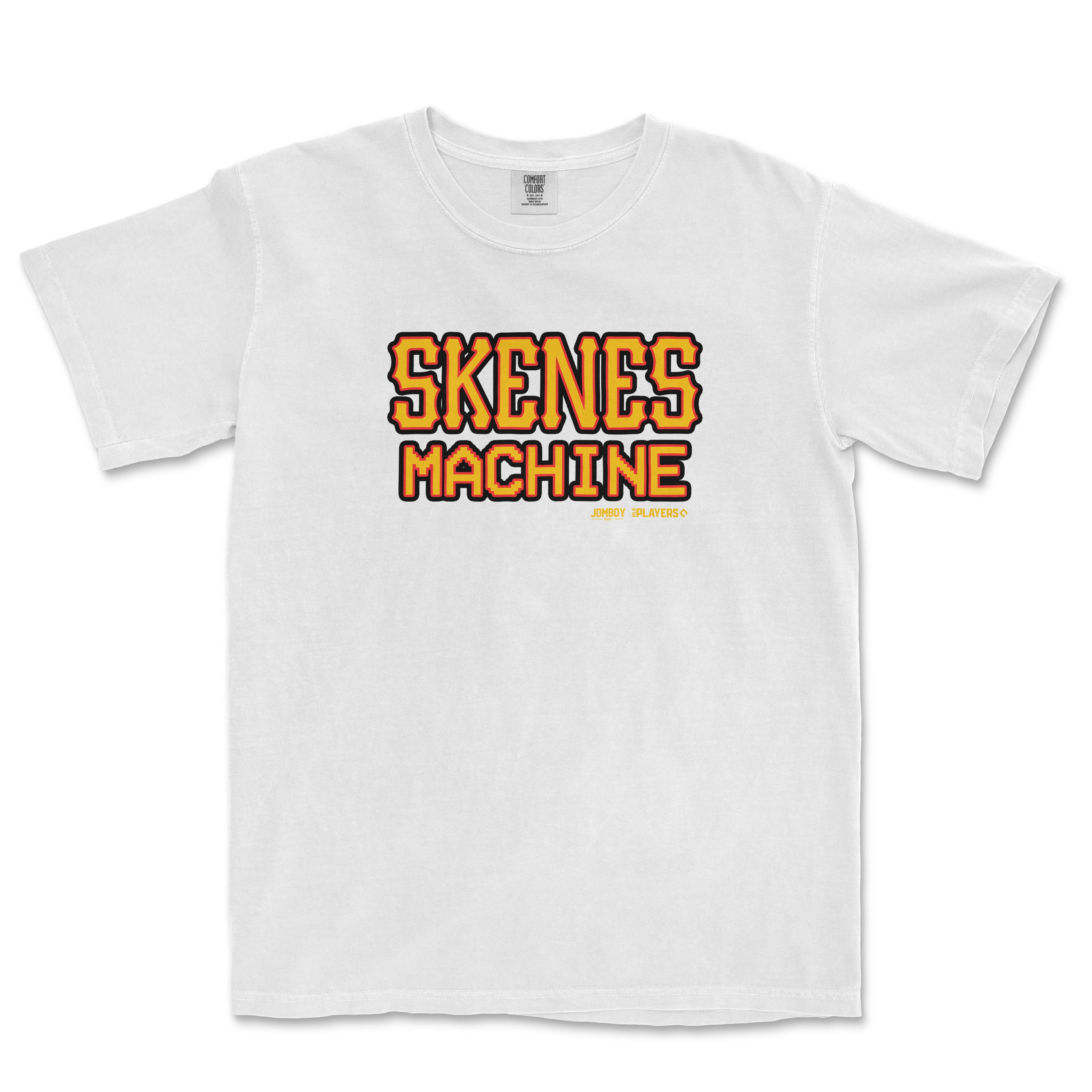 White T-shirt featuring bold, colorful "SKENES MACHINE" text in a retro style with smaller yellow text below.