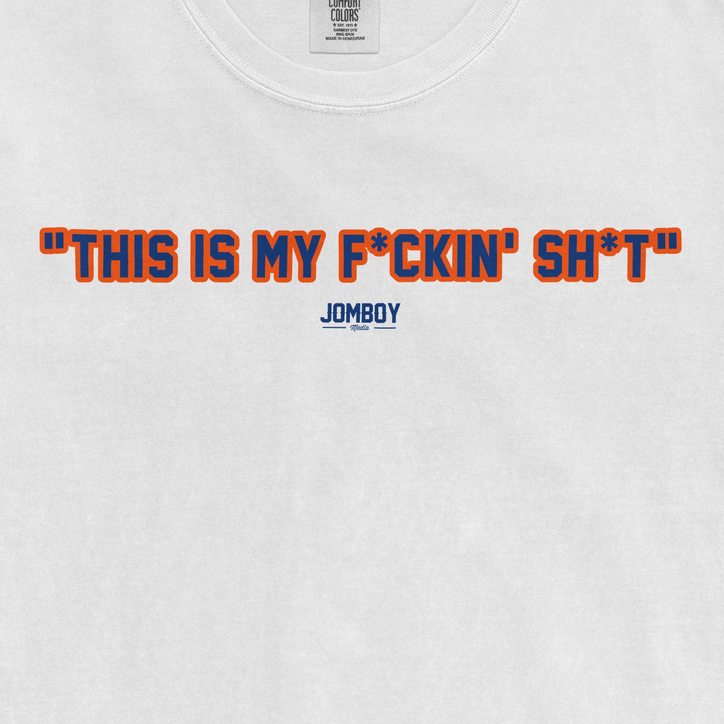 White T-shirt with bold orange and blue text that reads "This is my f*ckin' sh*t" and a small blue "Jomboy Media" logo below.