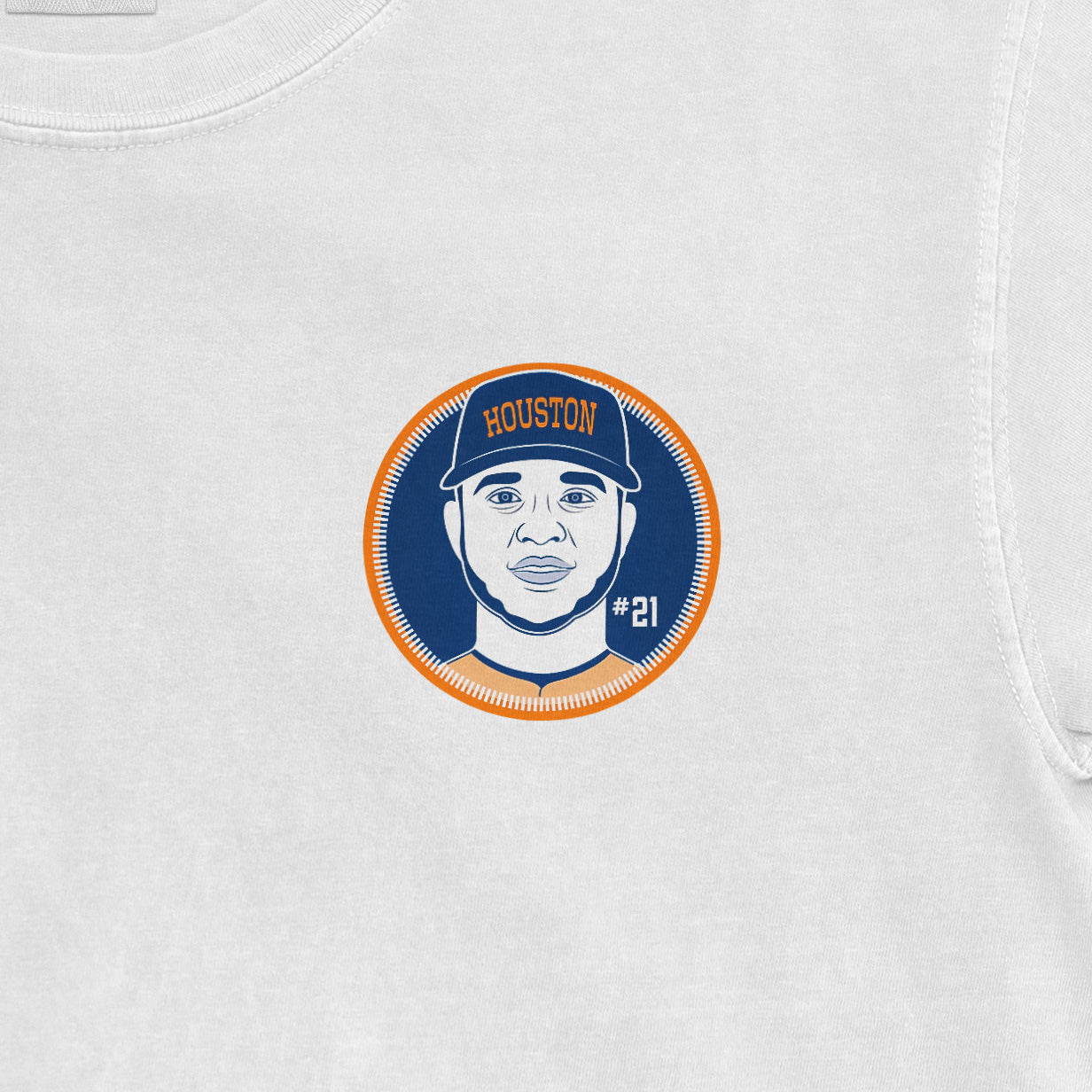 Close-up of a white Yainer Diaz shirsey featuring a circular graphic of a player wearing a Houston cap, with the number 21.