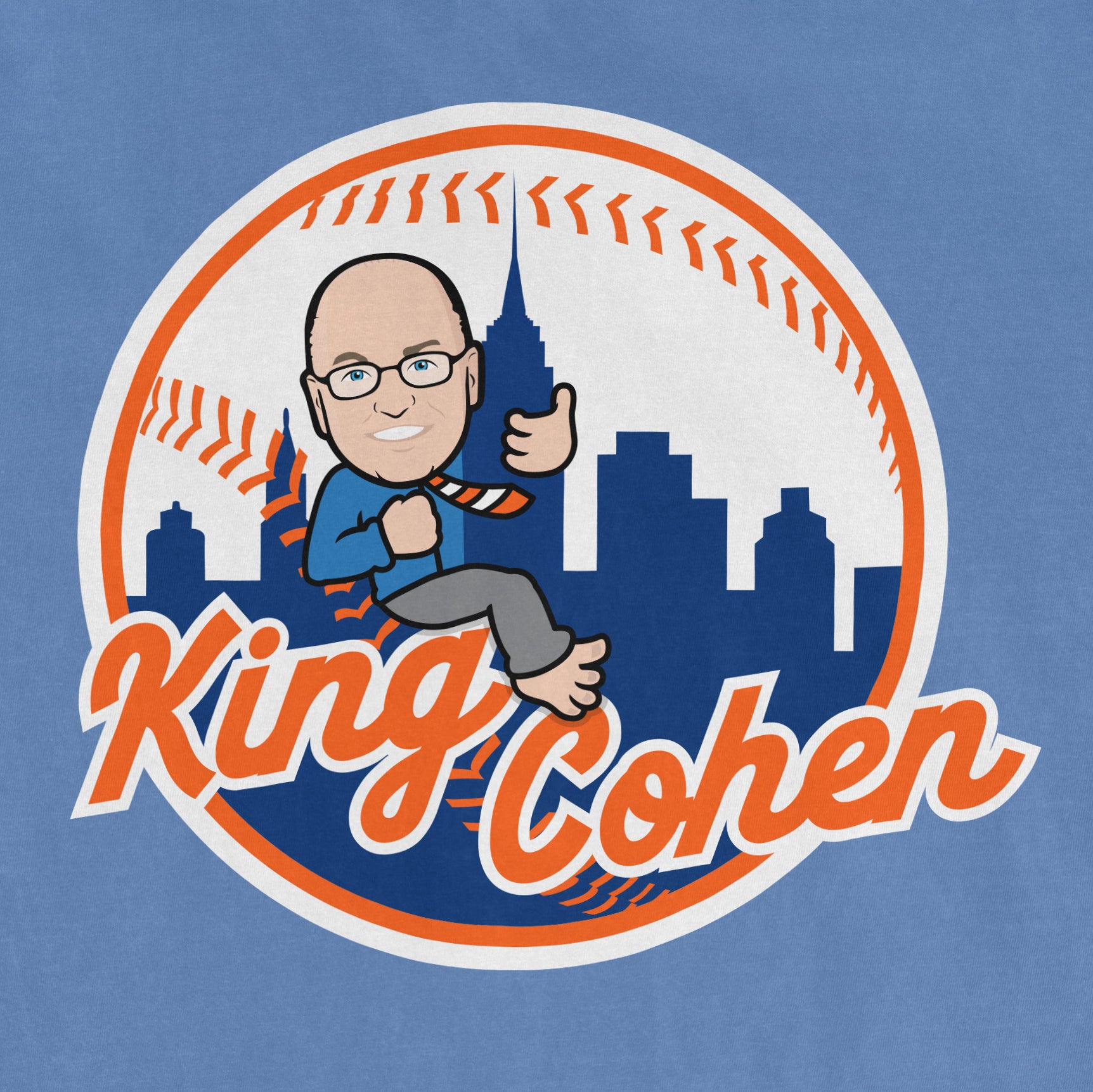 Blue Comfort Colors T-shirt featuring a cartoon of King Cohen with glasses, a blue shirt, gray pants, and a city skyline background.