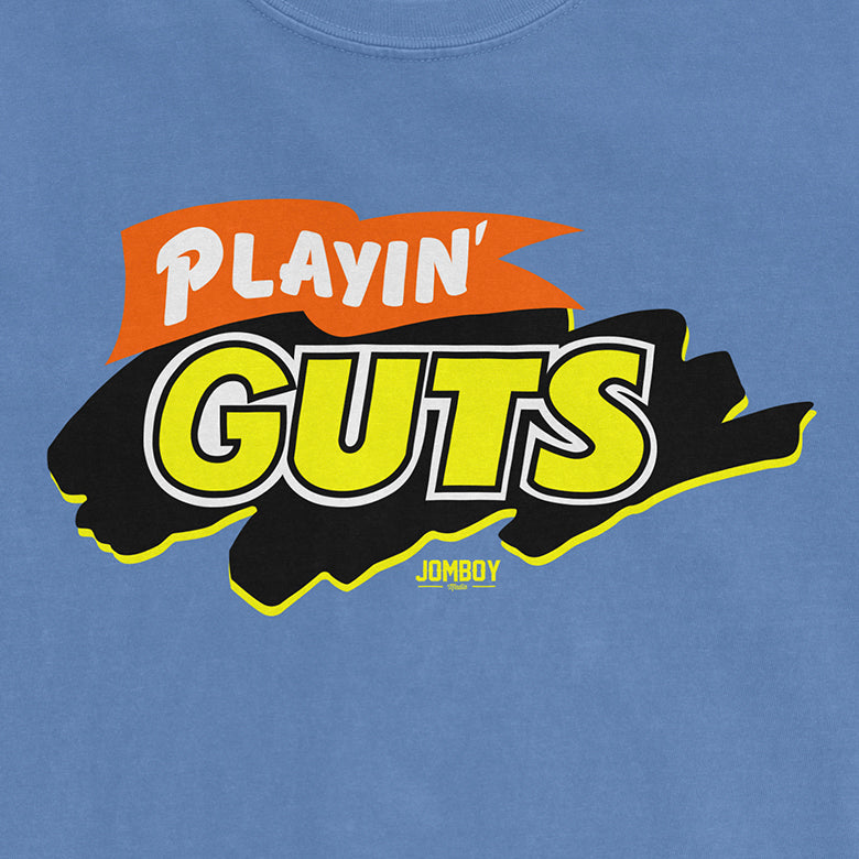 Bright blue T-shirt featuring a bold, colorful "PLAYIN' GUTS" graphic with yellow, black, white, and orange accents.