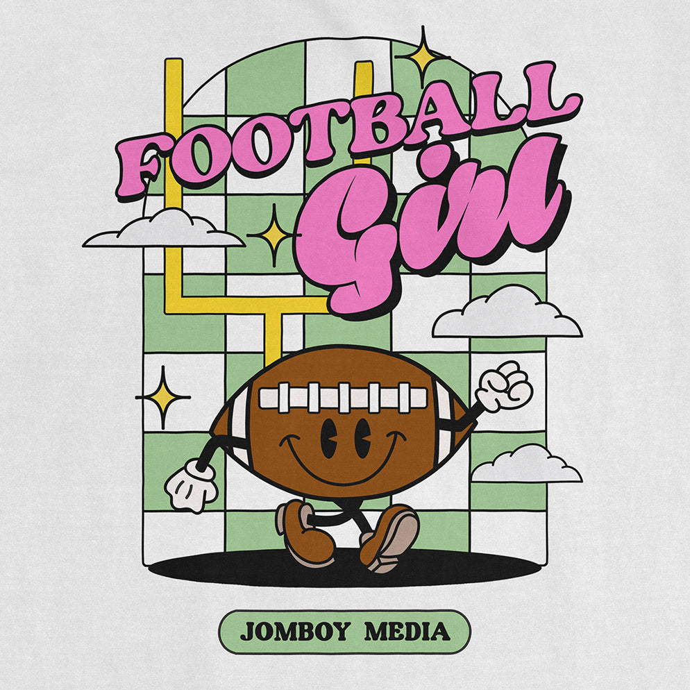 Cute cartoon football character with a smiling face, wearing a helmet, running with a raised fist, on a Comfort Colors tee.