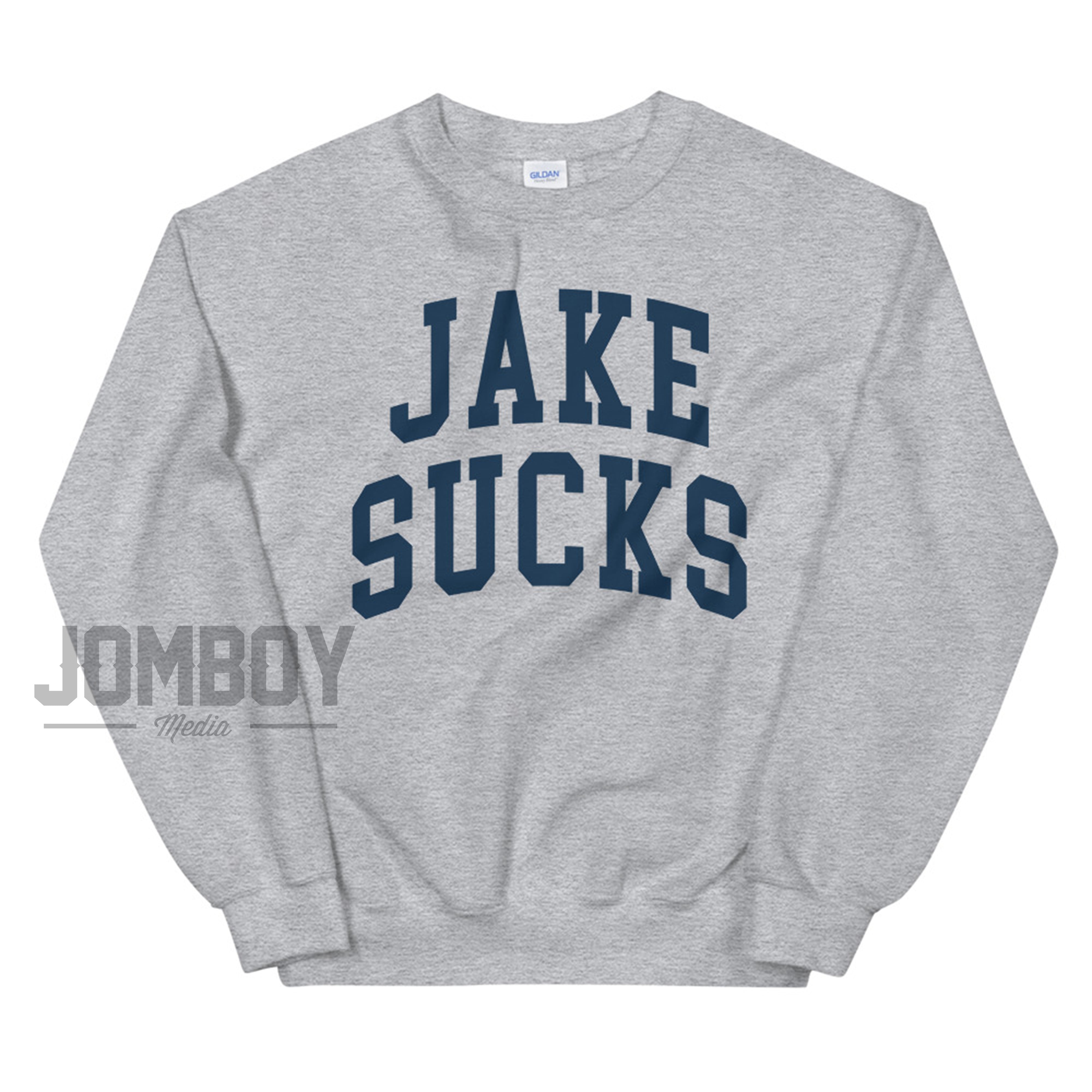 Gray sweatshirt with bold navy text reading "JAKE SUCKS" across the front, casual and oversized fit.