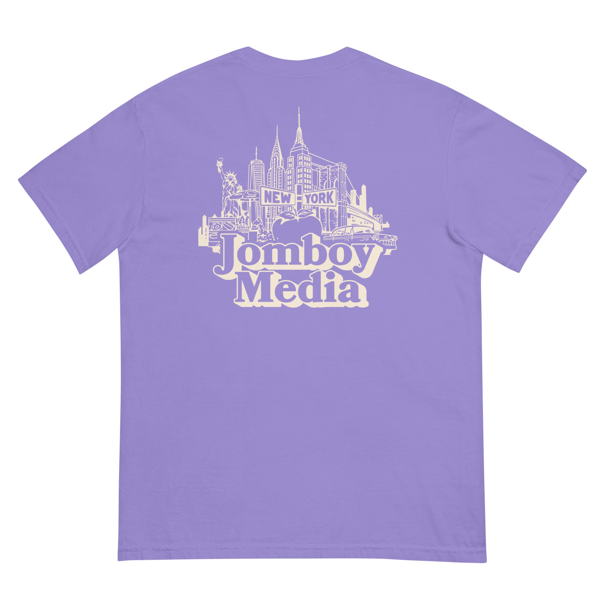 Back of a purple T-shirt featuring a white line drawing of New York City skyline with "Jomboy Media" text below.