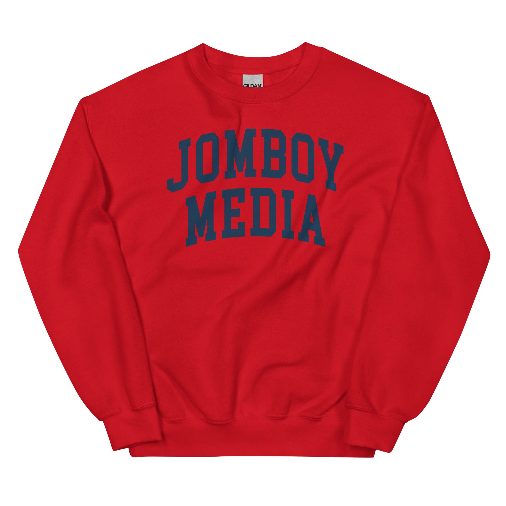 Red sweatshirt with "JOMBOY MEDIA" printed in bold navy blue letters across the front.