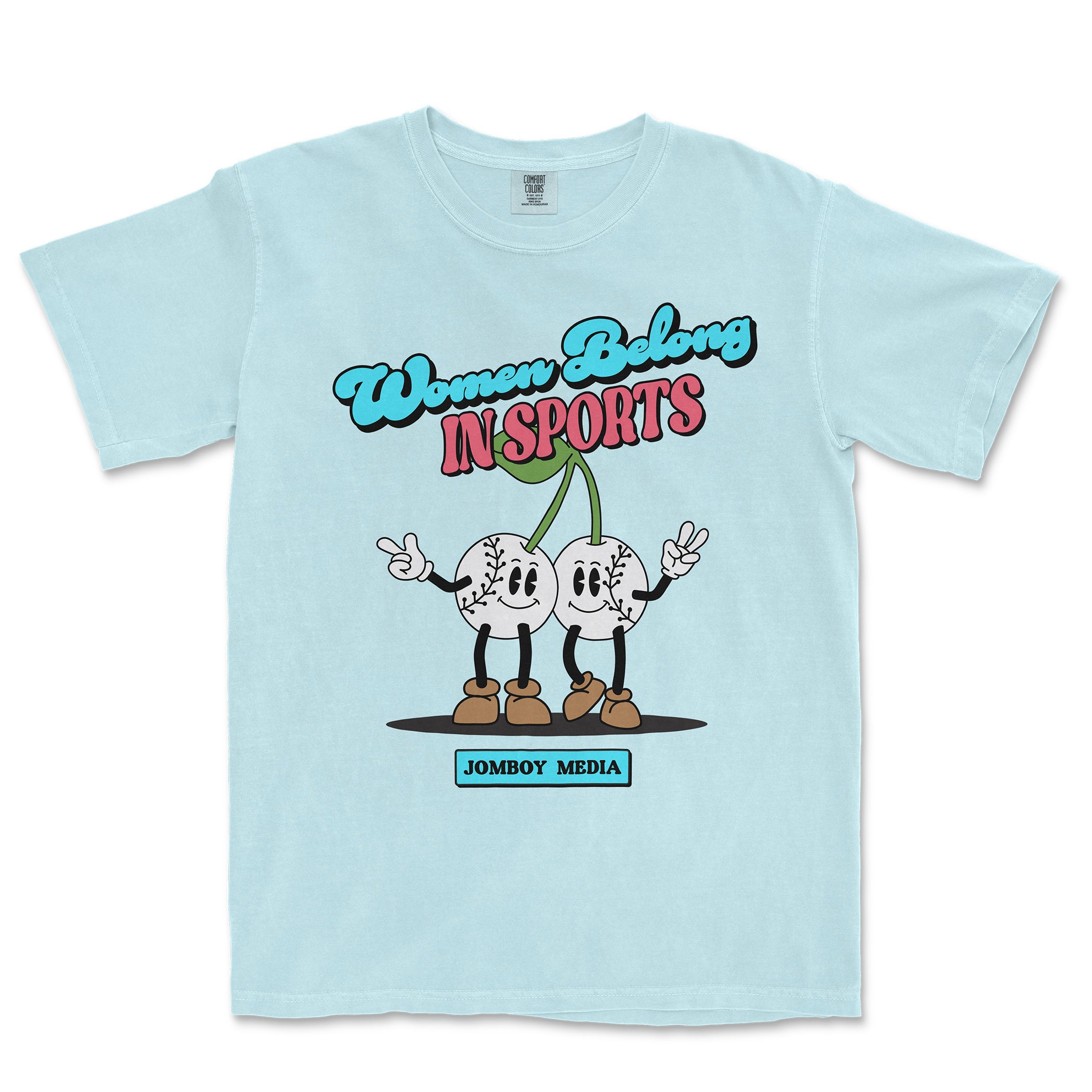 Light blue T-shirt with cartoon baseball characters, bold text "Women Belong in Sports," and "JomboY Media" logo at the bottom.