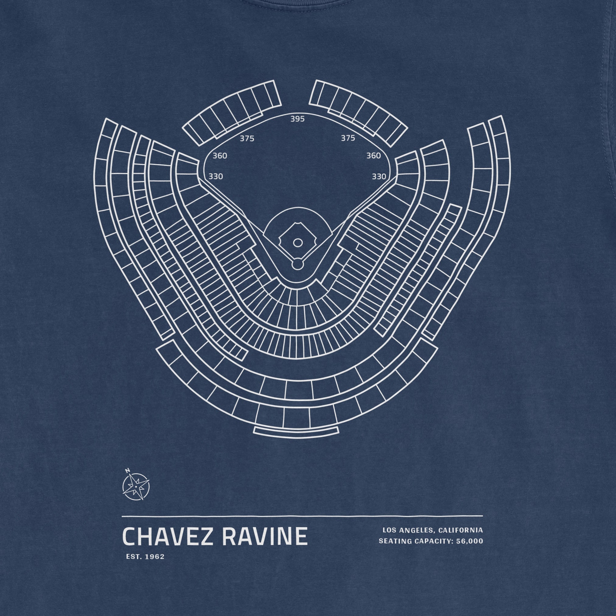 Blue Comfort Colors T-shirt featuring a white line drawing of Chavez Ravine stadium seating and field layout, with text details.