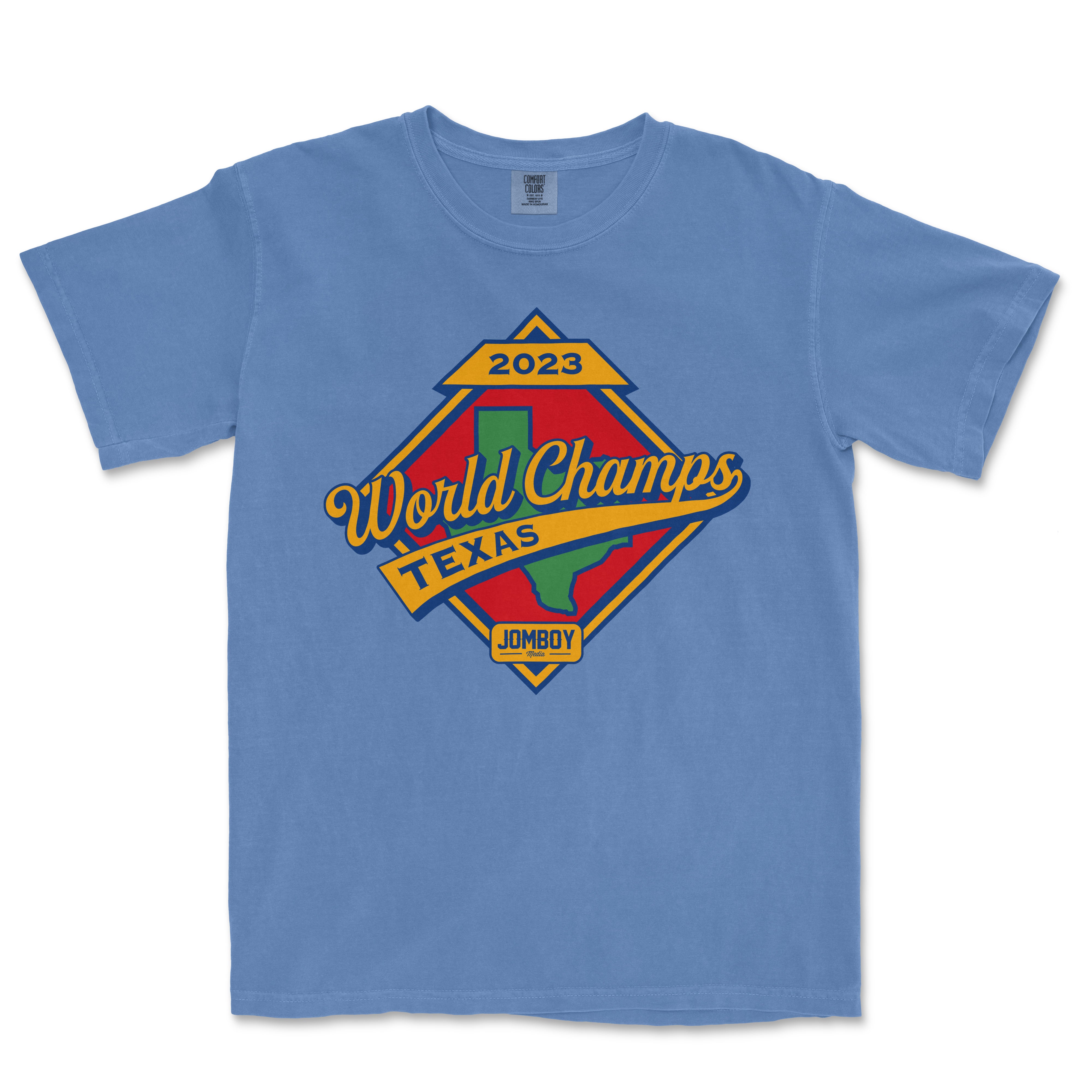 Blue T-shirt featuring a colorful vintage-style graphic celebrating the 2023 World Champs in Texas, with a Texas map and JomboY logo.