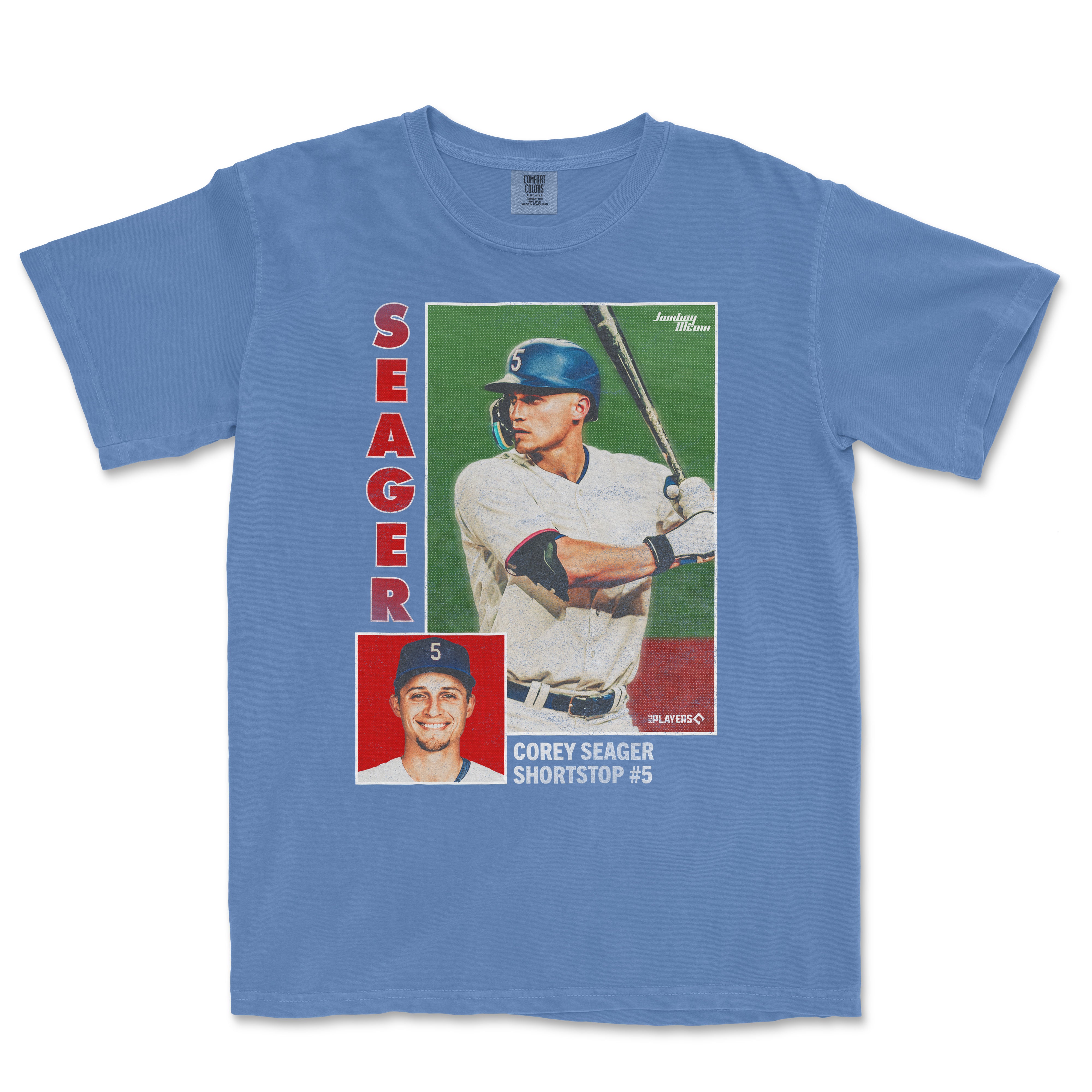 Blue T-shirt featuring a vintage-style Corey Seager baseball card with images of him in a batting pose and smiling, with bold red and white text.